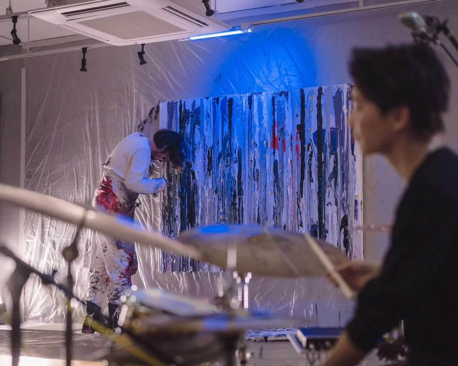 Artist in Action During Live Painting Performance