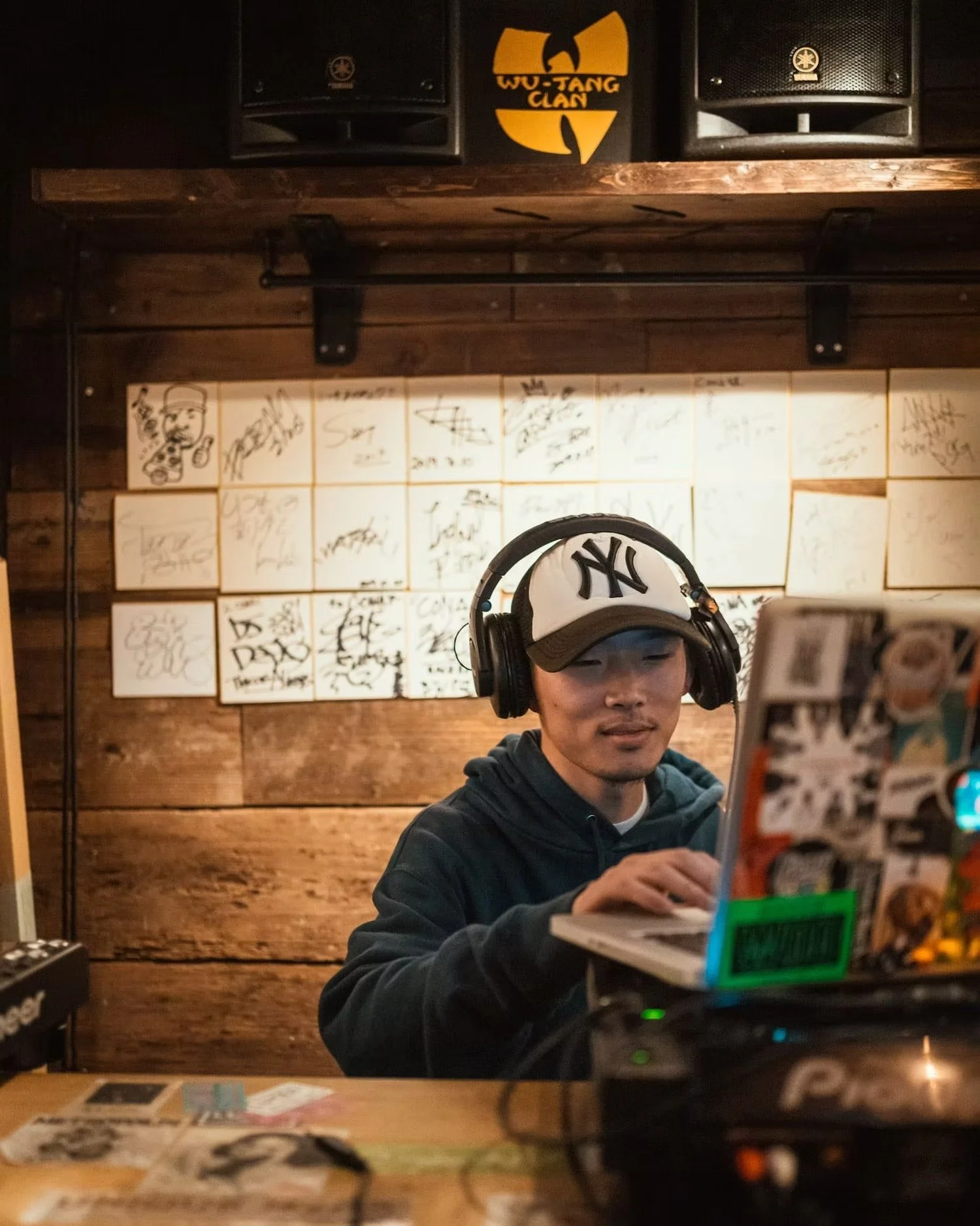 DJ playing music at a lively event in Shibuya