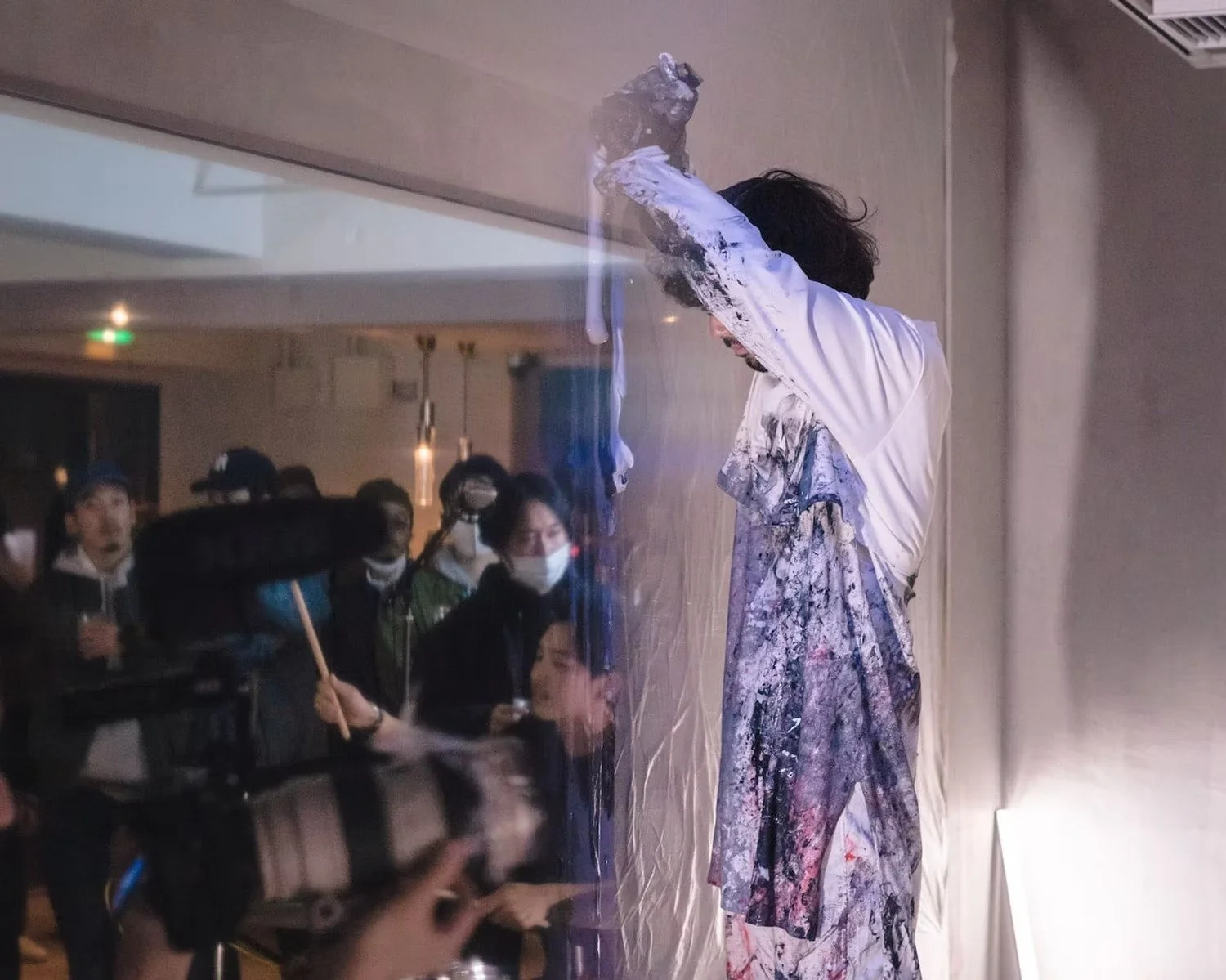 Live Art Performance Captured Behind Glass
