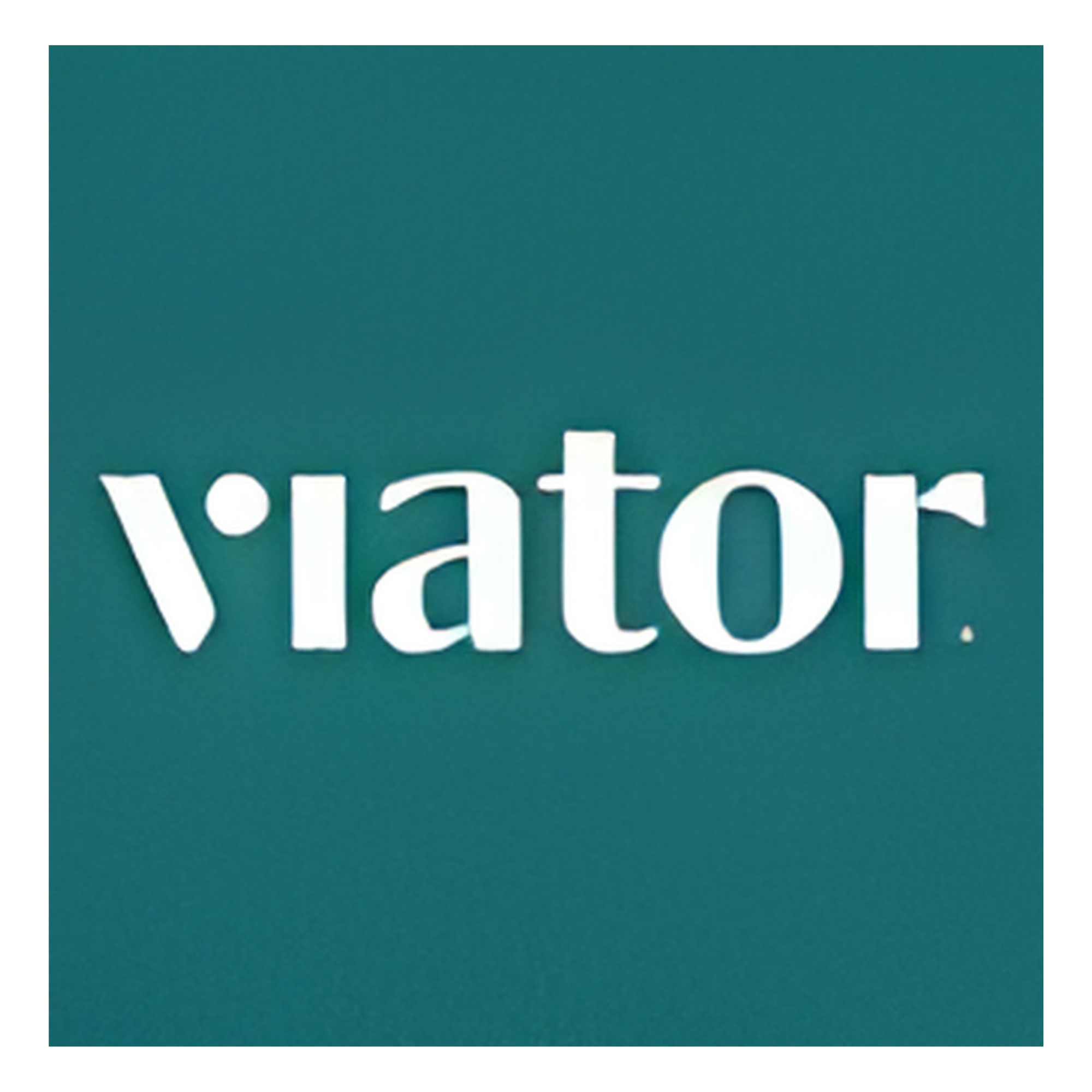 Close-up of a teal sign featuring white text that starts with 'Y'. The text is partially visible.