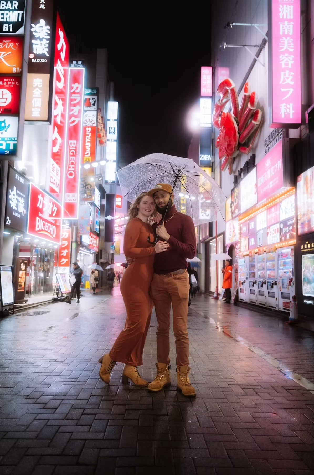 Couples photoshoot in Shinjuku in the rain giving a cinematic look shot by Tokyo couples photographer Deniz Demir