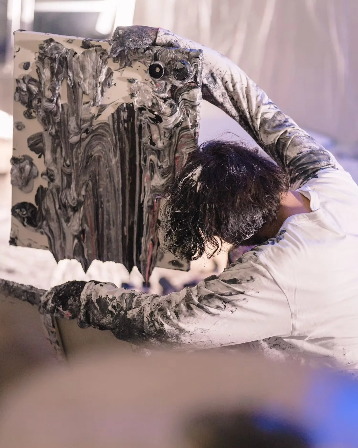 Artist Working on Abstract Painting