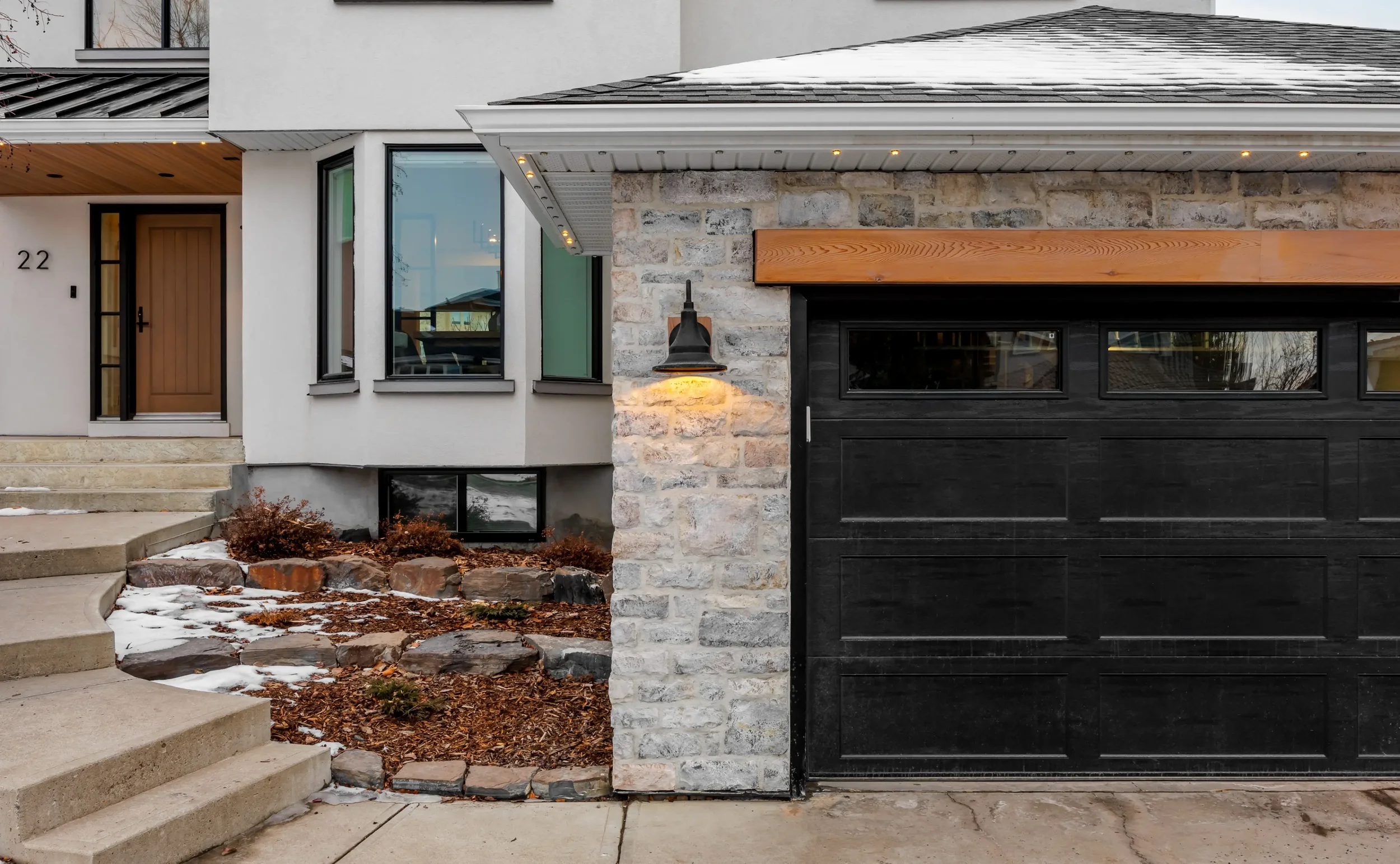 home-renovation-calgary-exterior-garage-stonework.webp