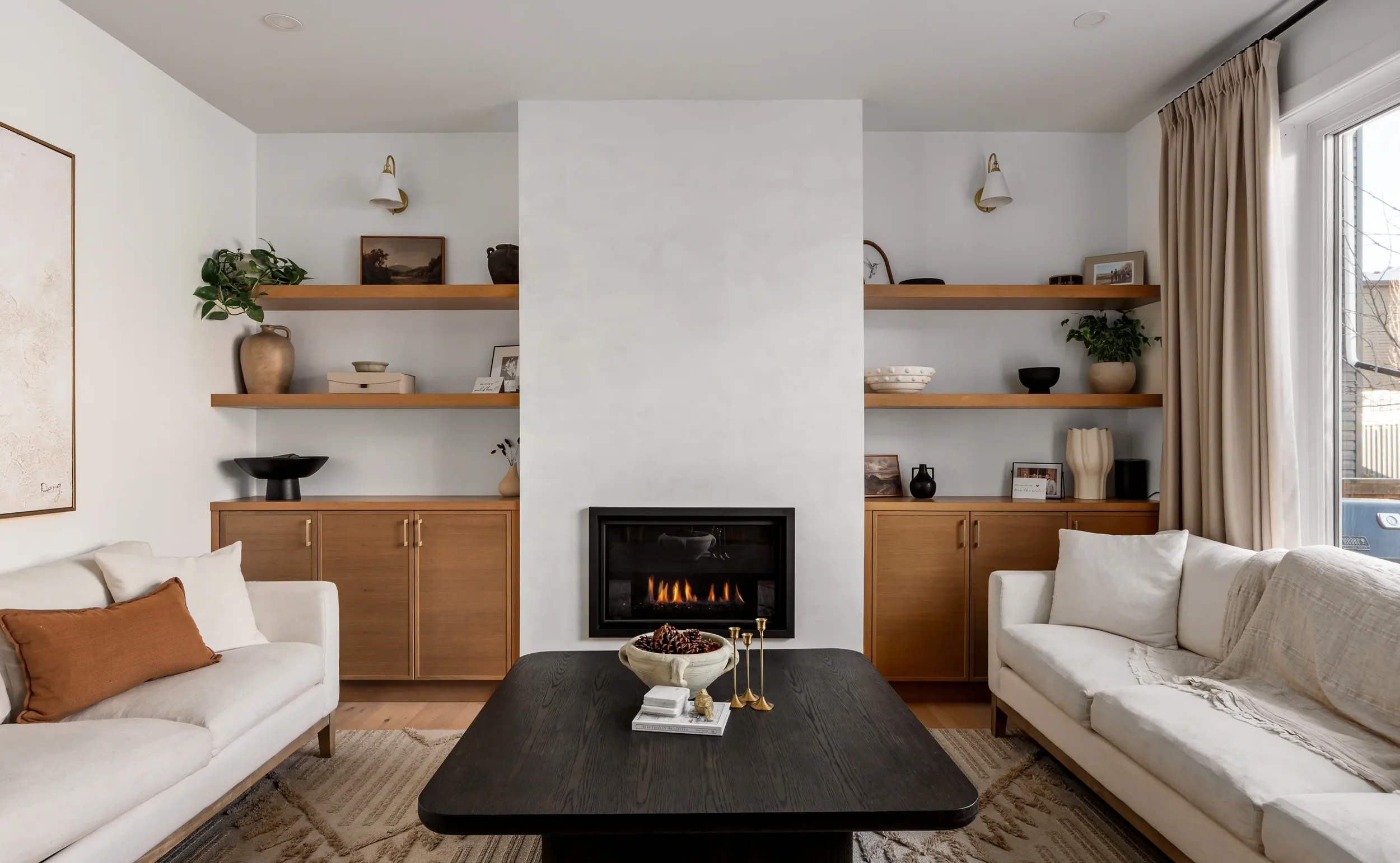 luxury-home-renovations-calgary-cozy-living-room-fireplace.webp