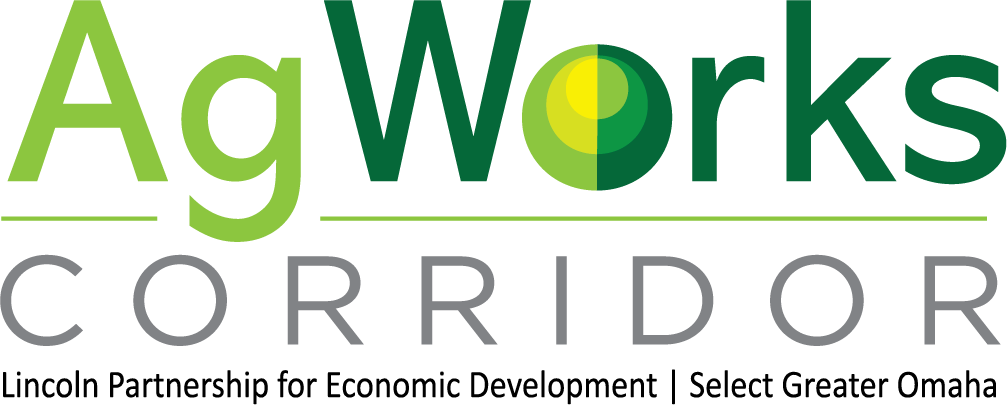 Logo of AgWorks Corridor with green and yellow text and graphics.
