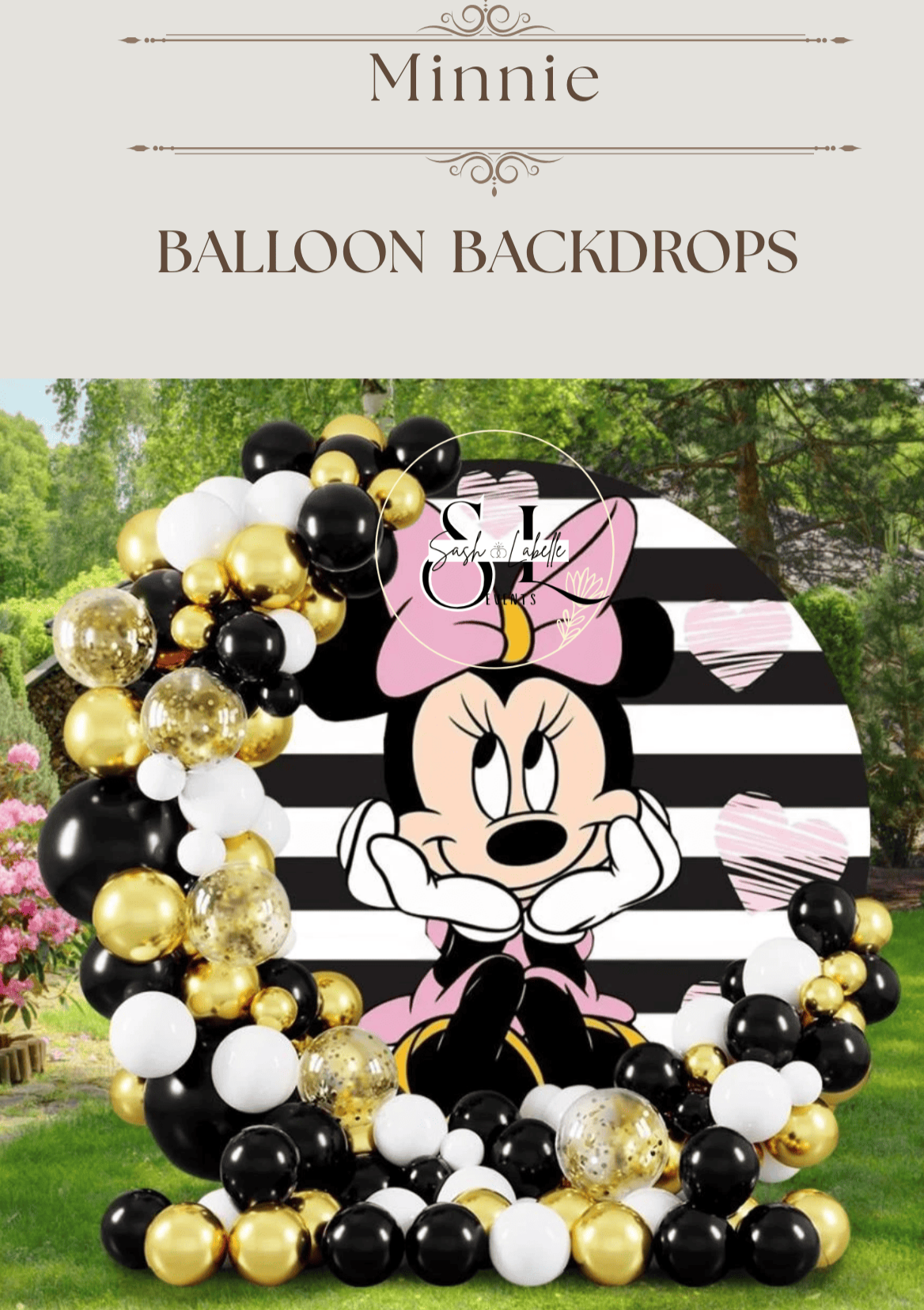 Party backdrop featuring Minnie Mouse poster, decorated with black, white, and gold balloons, set outdoors with trees and greenery in the background.
