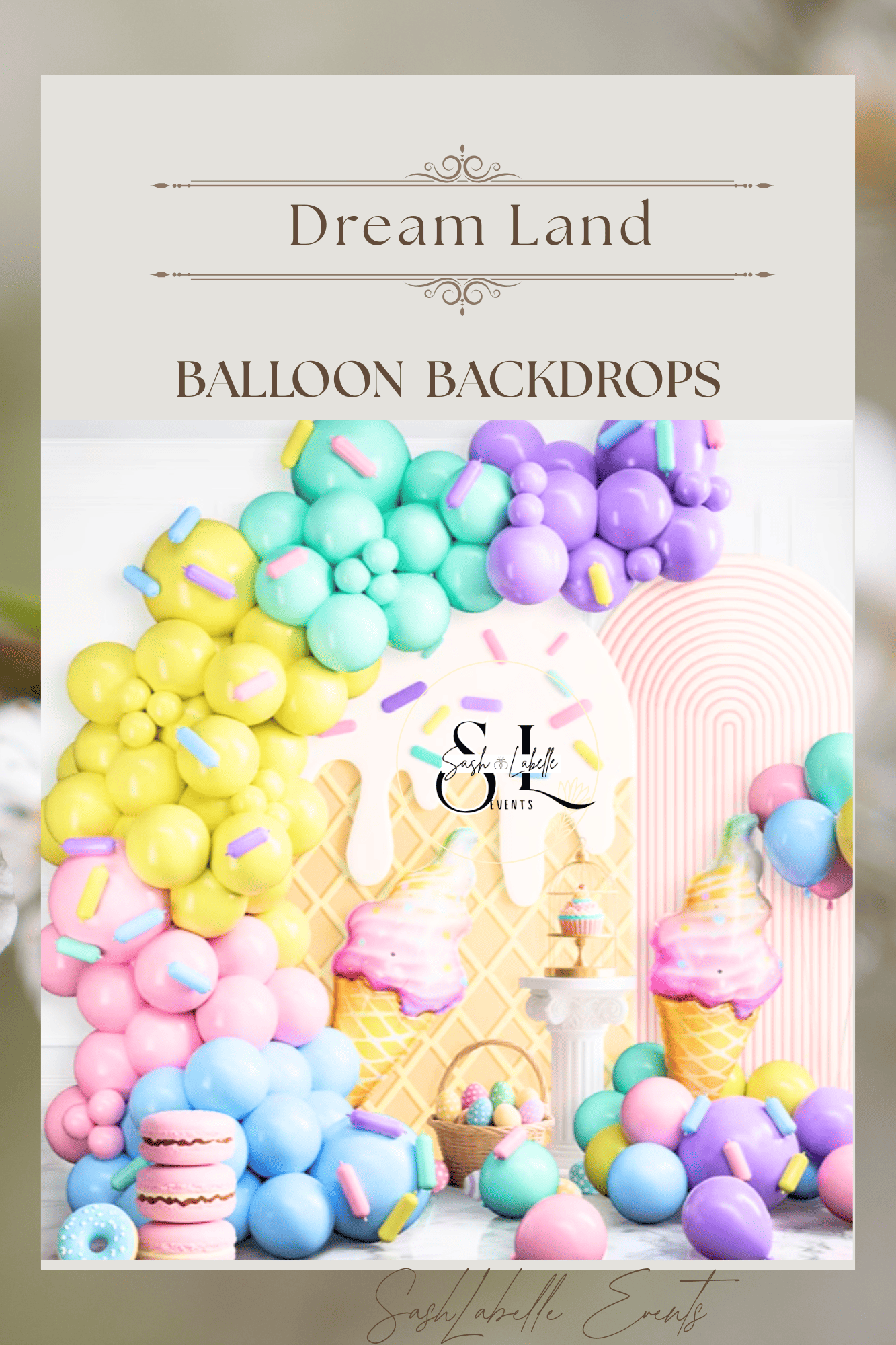 Colorful balloon backdrop with pastel pink, yellow, purple, and blue balloons, decorated with sprinkles and ice cream-themed props for a celebration or event.