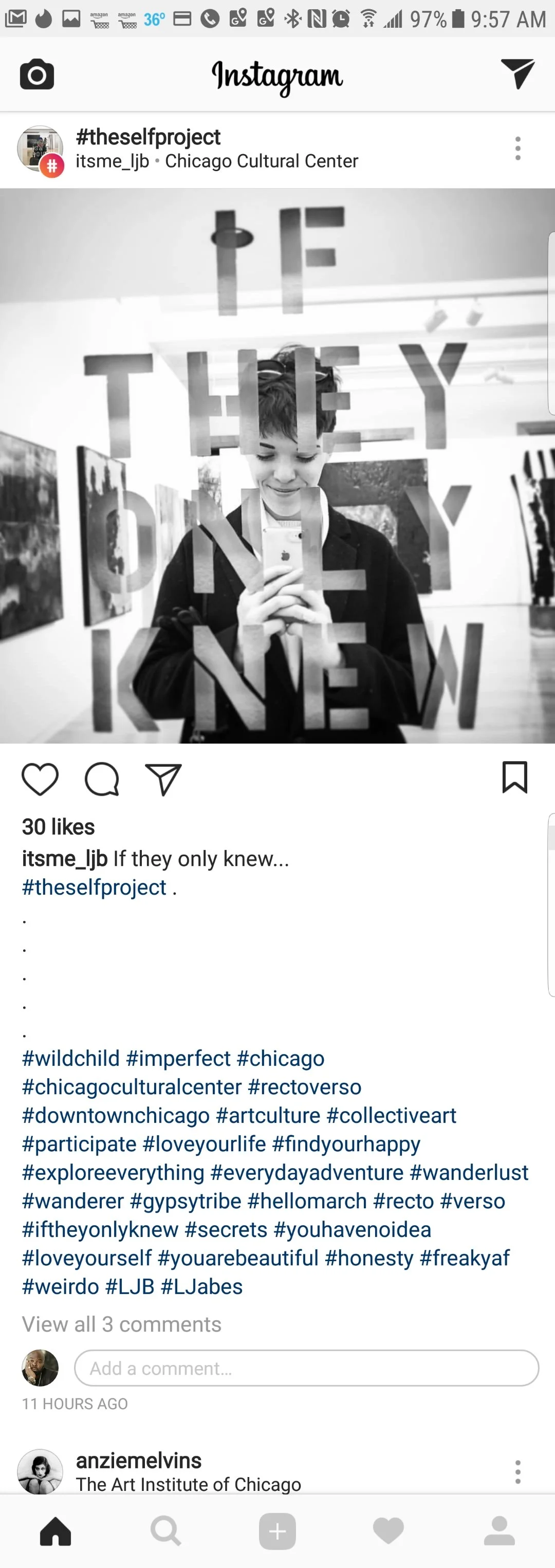 A person taking a selfie in an art gallery, seen through a glass panel with the phrase 'IF THEY ONLY KNEW' in large letters. The person is smiling, holding a smartphone, and surrounded by artwork.