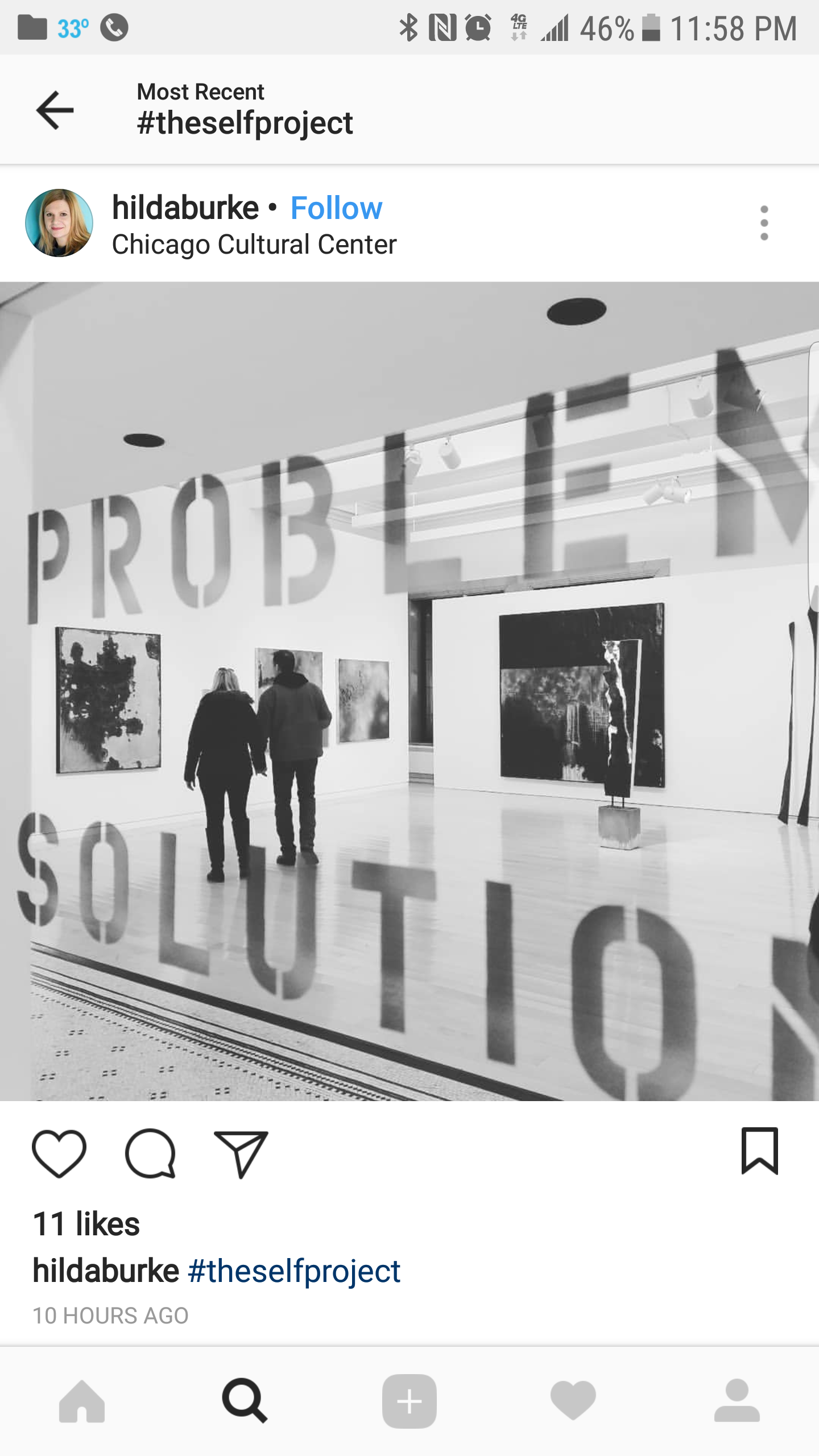 Black and white photo of an art gallery with paintings on the walls and sculptures on the floor, featuring a large window. The image has a reflection of the word 'PROBLEM' and 'SOLUTION' on the glass