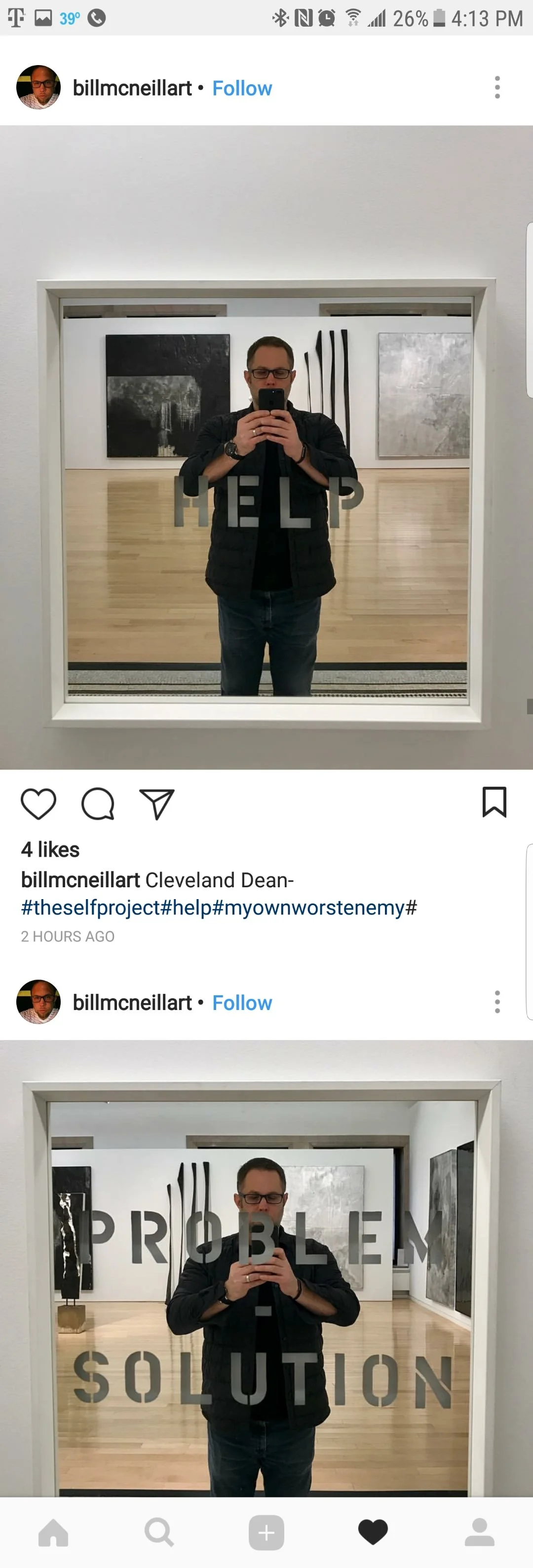 A man taking a selfie in a museum mirror with the words 'HELP' on the top mirror and 'PROBLEM SOLUTION' on the bottom mirror, with artwork in the background.