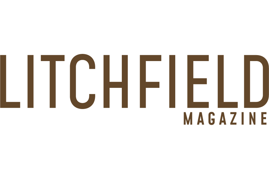 Litchfield Magazine logo in brown font on a black background.