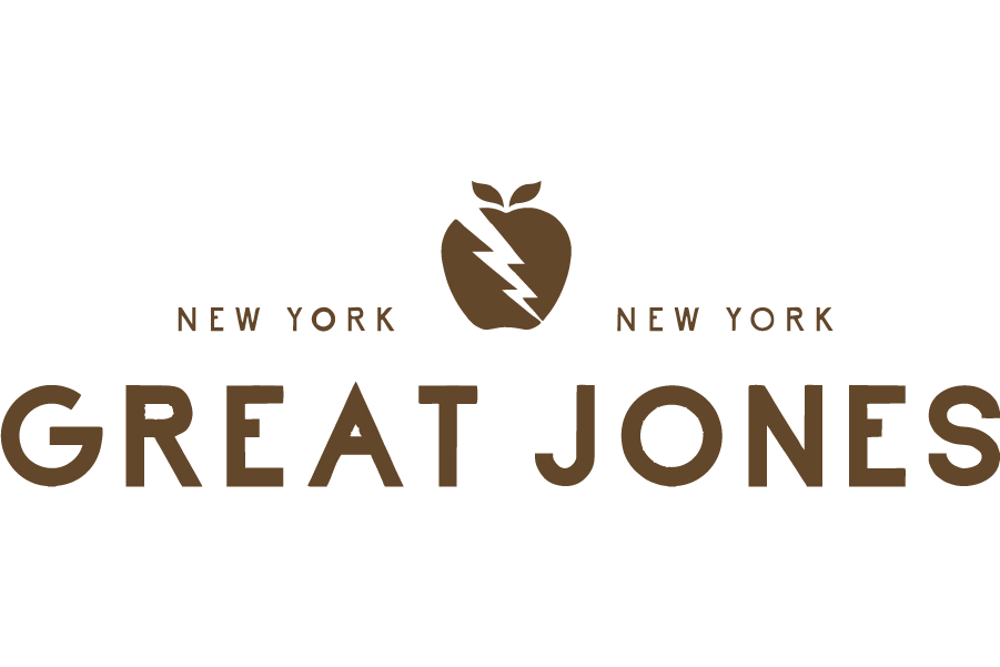 The logo of Great Jones, a brand from New York, featuring a stylized apple with a lightning bolt through it and the text "New York" above and below, and "Great Jones" below.
