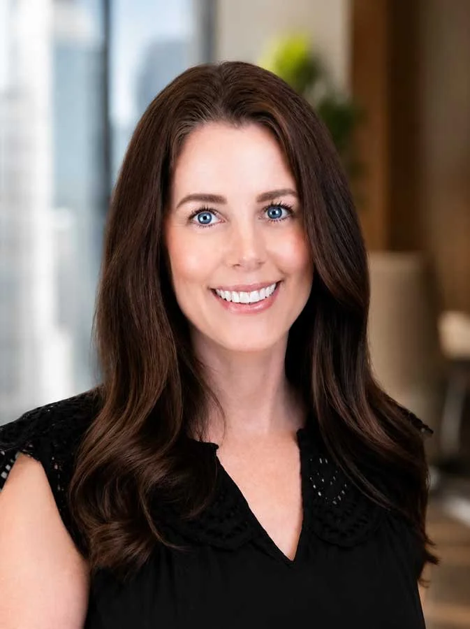 Portrait of a woman with long brown hair, Mary secretary at Winn Financials & Tax Services in Redding, CA