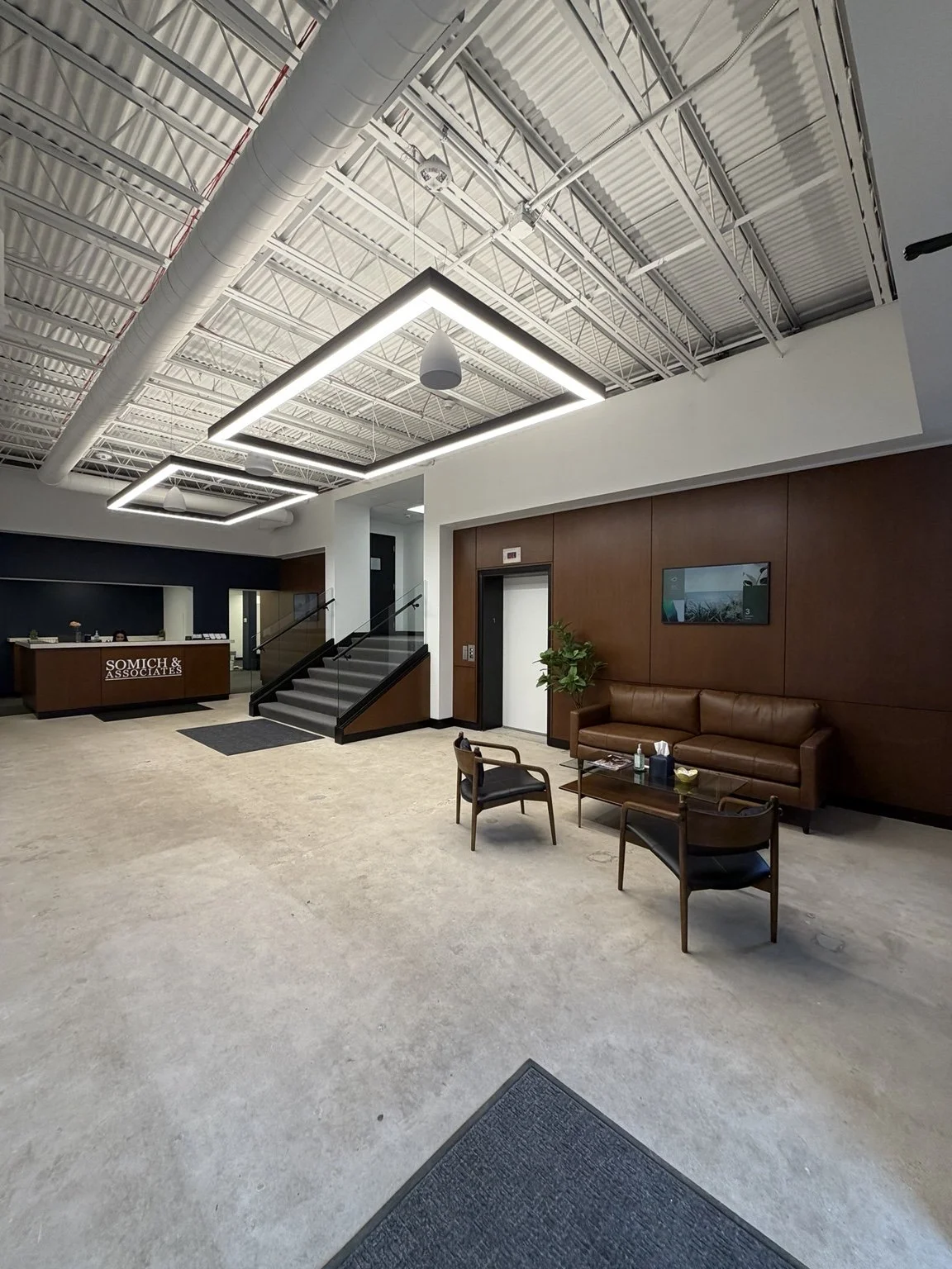 image shows the front entrance of the somich and associates offices