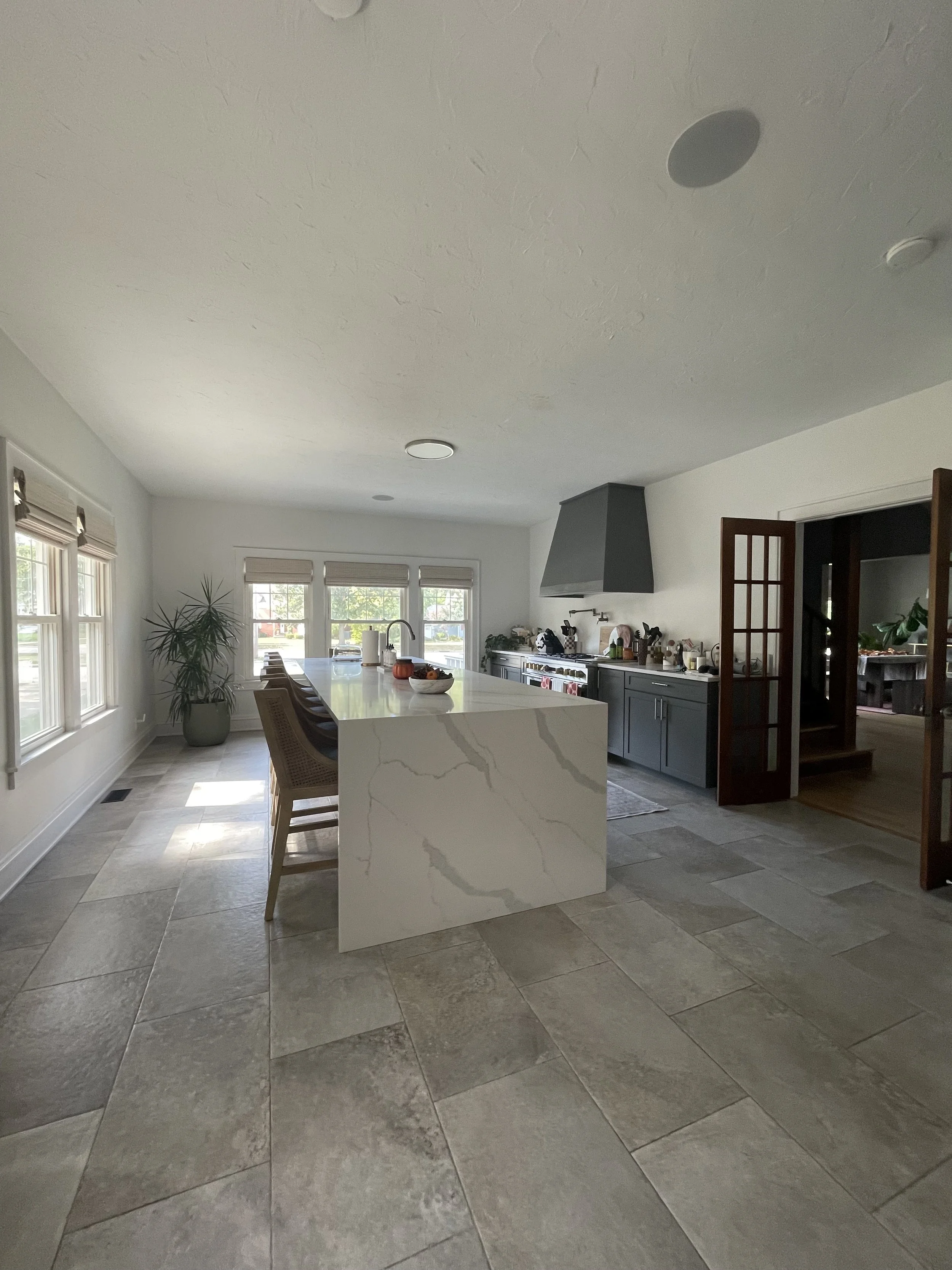 photo shows the large, marble waterfall countertop