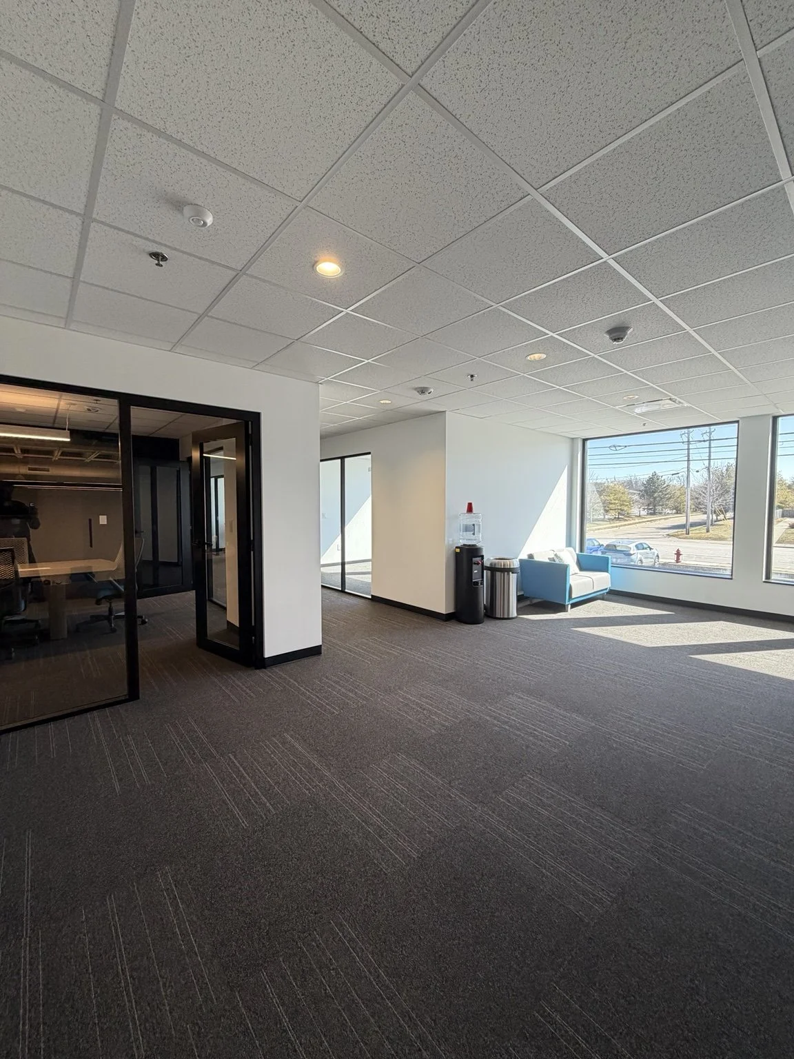 photo shows a bright office hallway looking out onto mentor avenue
