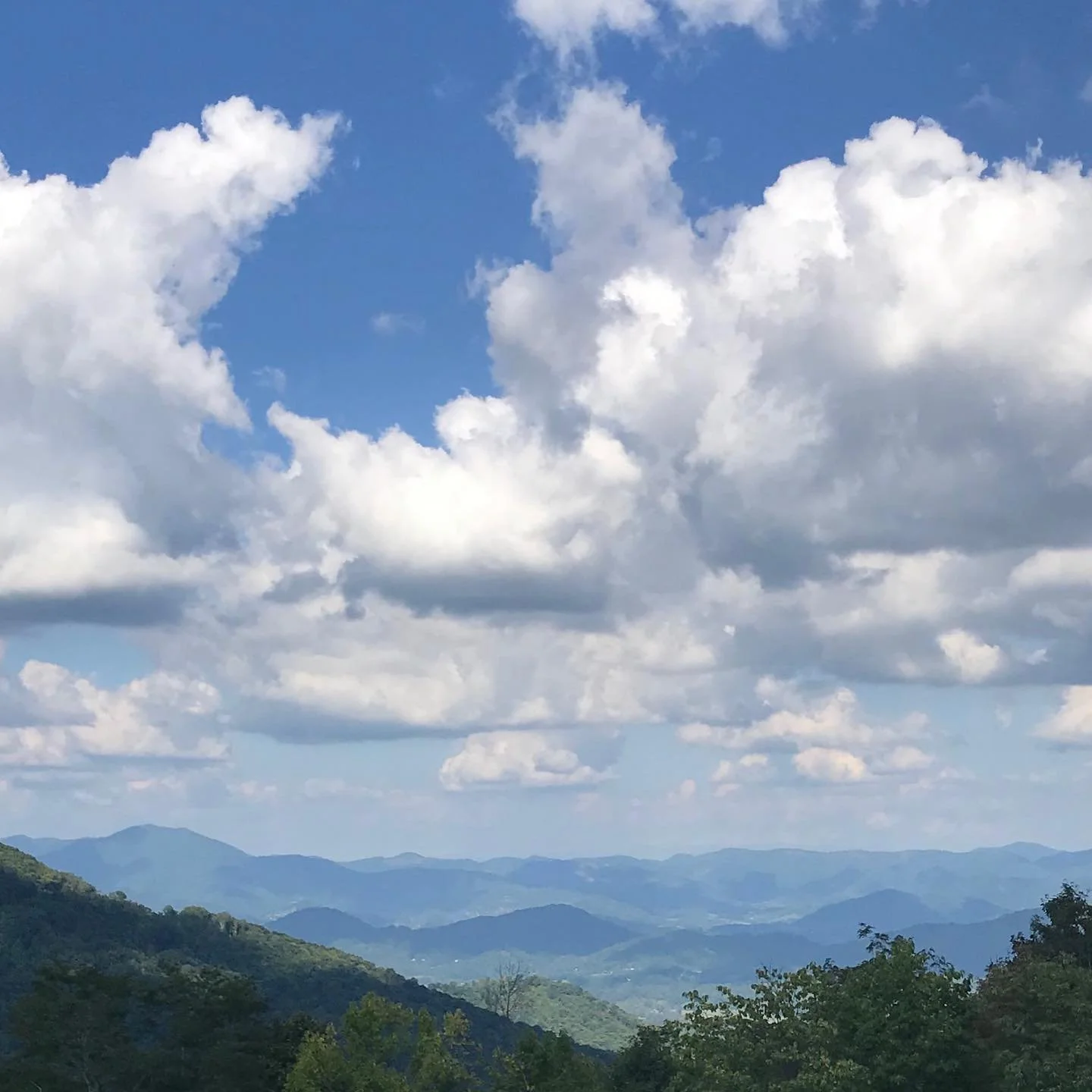Carolina mountains on a partly cloudy day.  Where the sky is ever changing with the breeze.  Favorite view, the mountains are really blue!  #cattahoocheesky  #blueridgemountains #middayview  #clouds #mountains #getoutside #naturelover