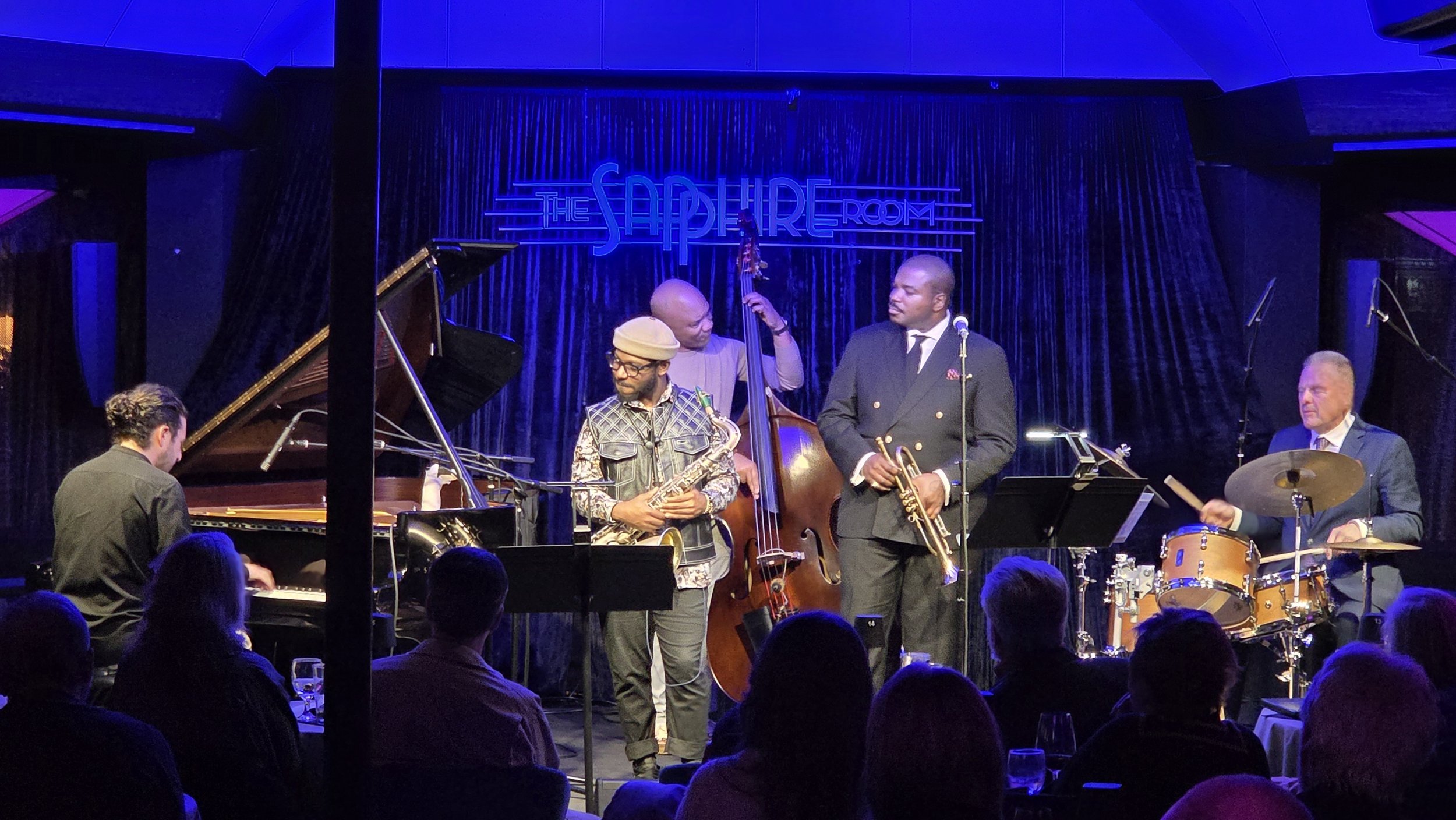 Emmet Cohen and his band playing at the Sapphire Room