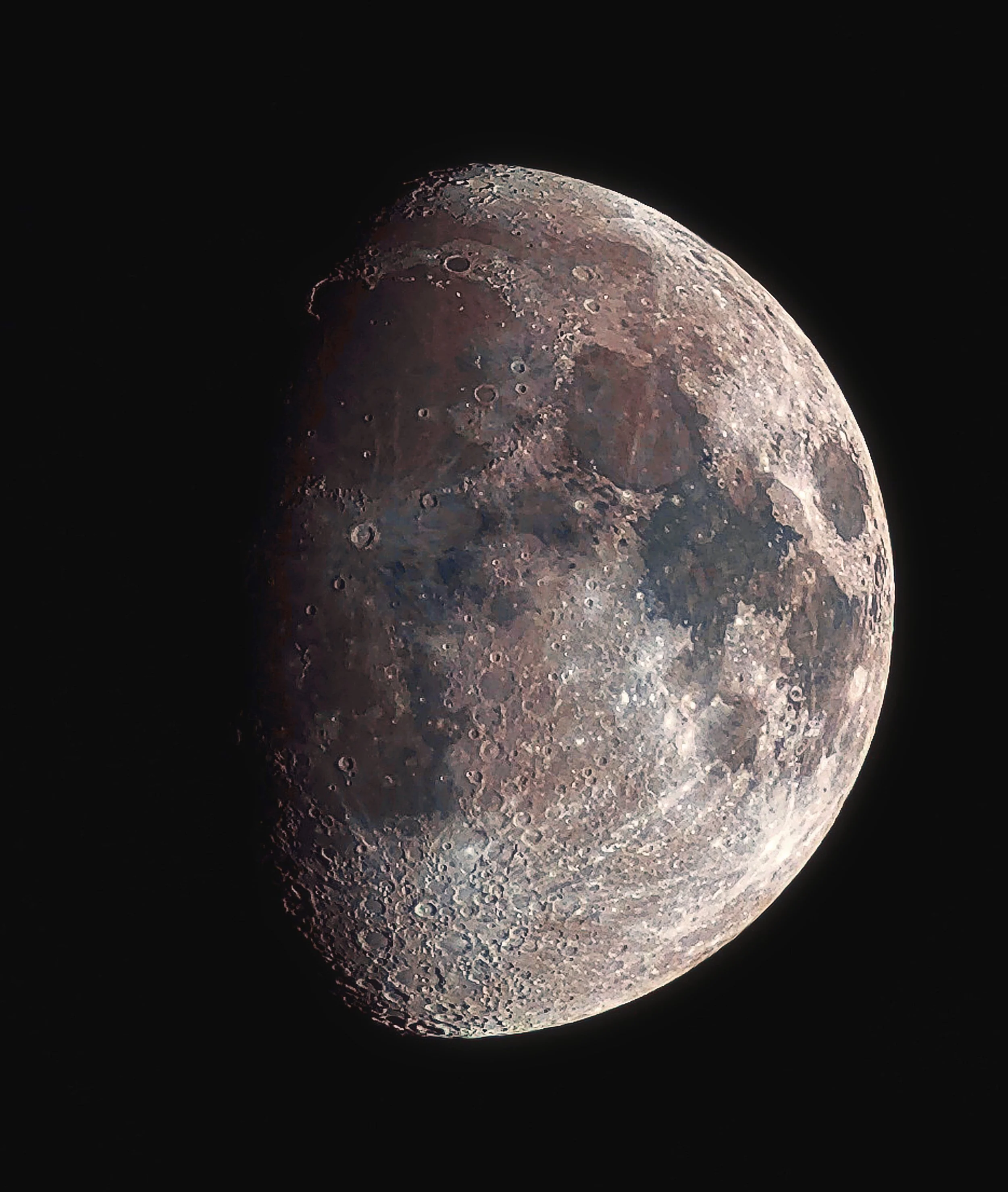 Close-up view of the moon's surface showing craters and rough terrain against a black space background.