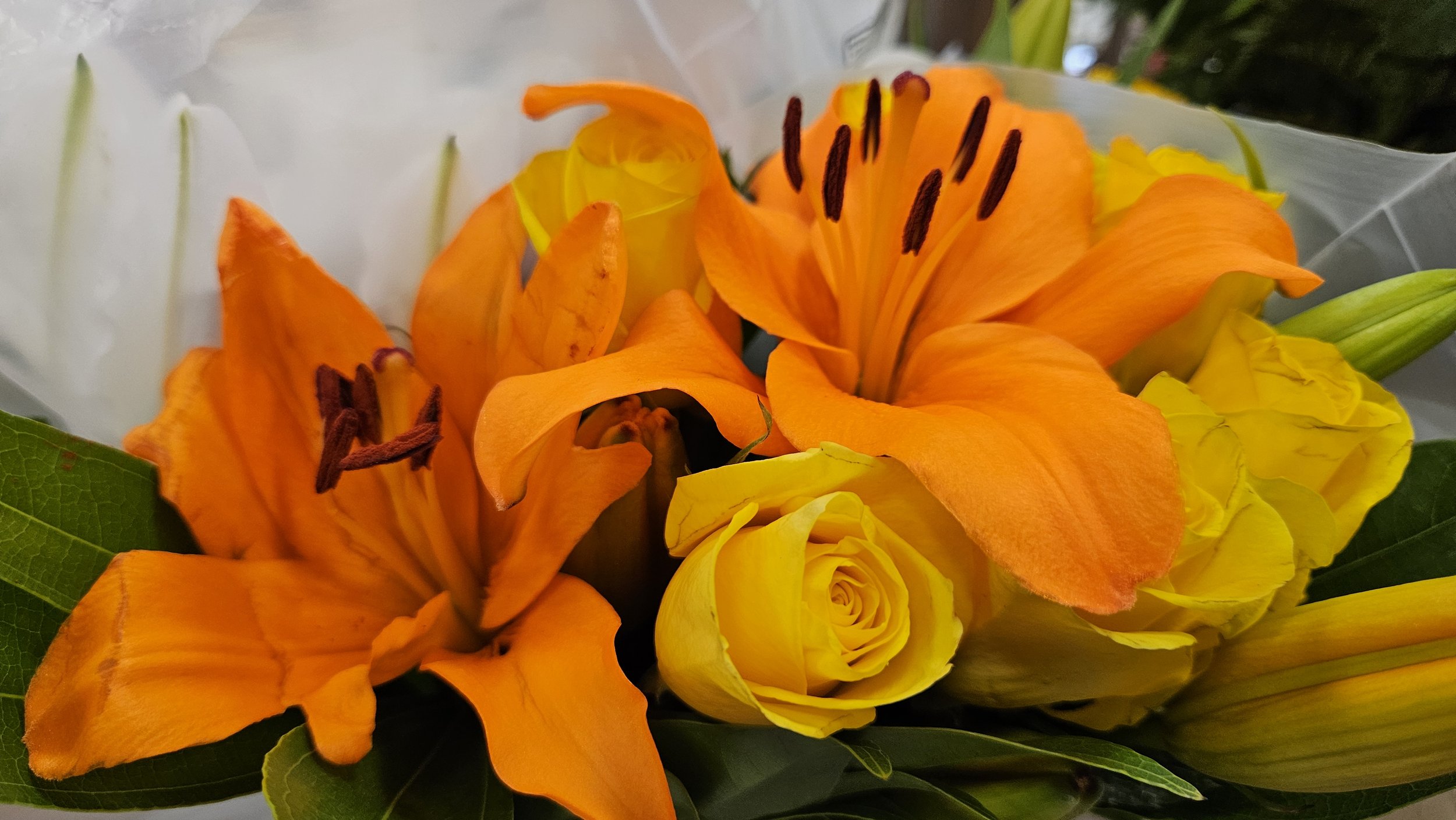Orange Asiatic lilies & yellow roses