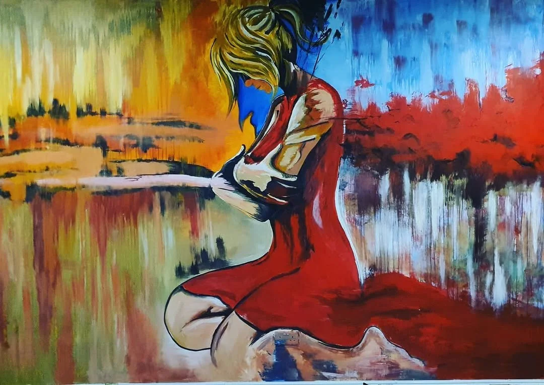 Abstract painting of a woman kneeling on the ground, wearing a red dress, with her head bowed and arms crossed, against a colorful background of yellow, orange, blue, and red hues.