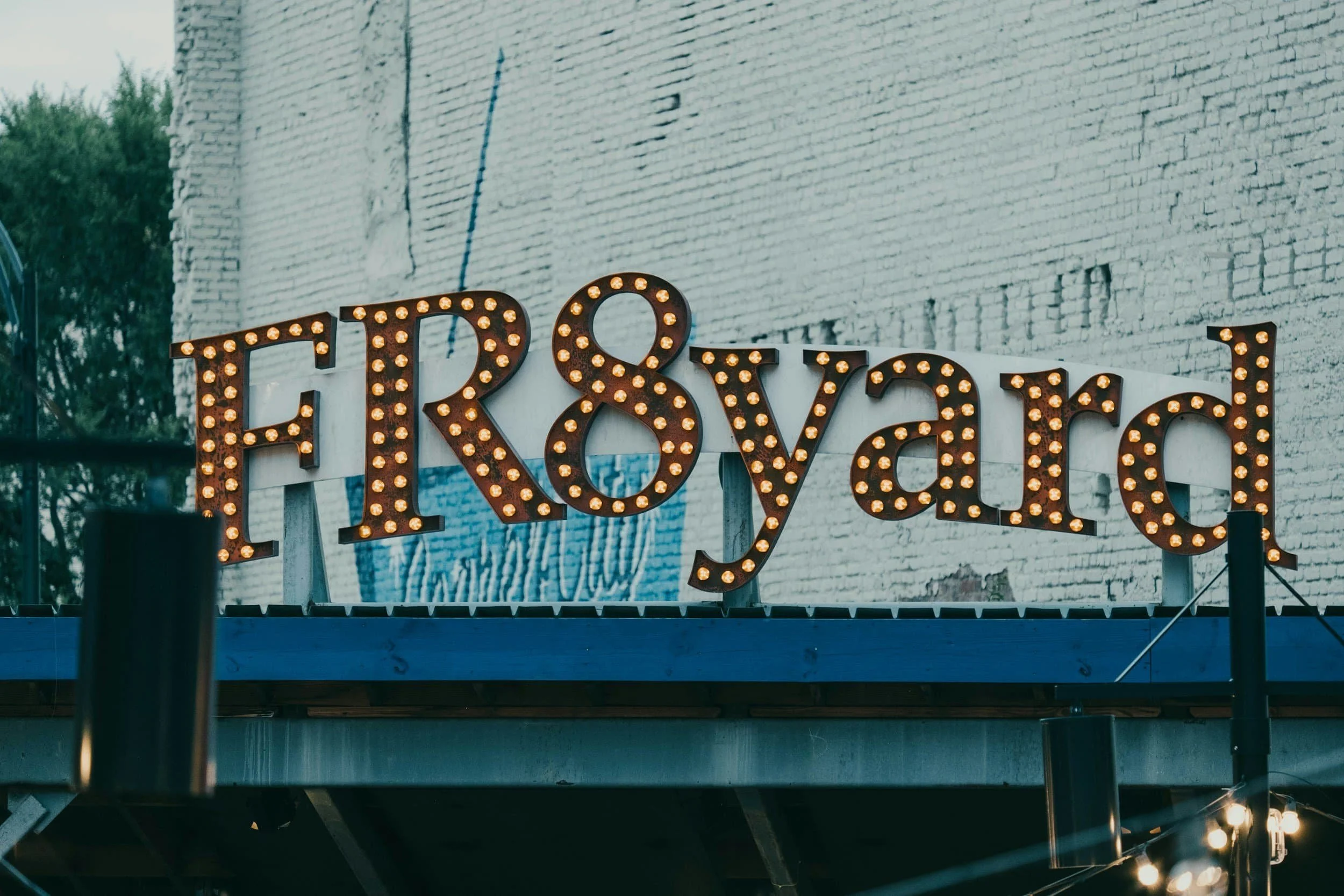 Vintage sign representing community and manufacturing culture.