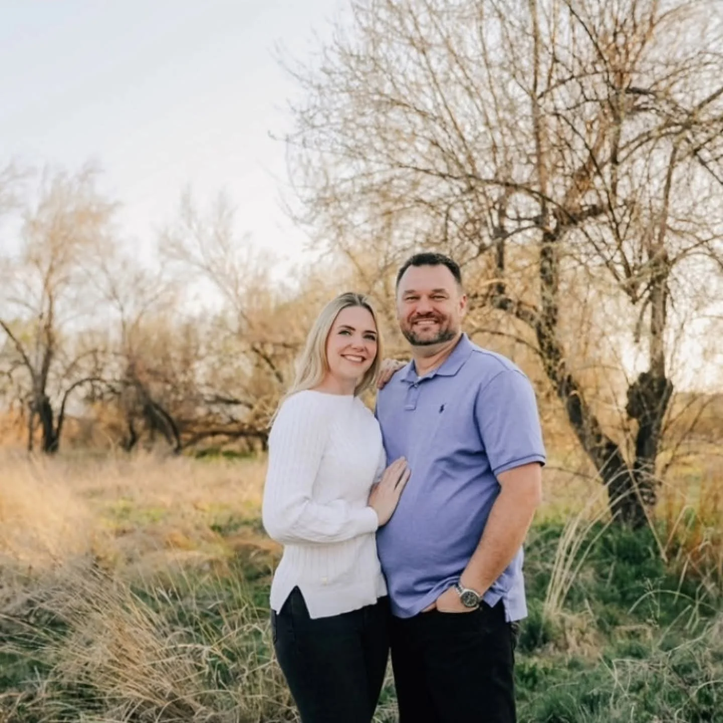 Owners of Scrub Tub mobile detailing smiling outdoors in Utah — family-owned car detailing business serving Northern Utah since 1999