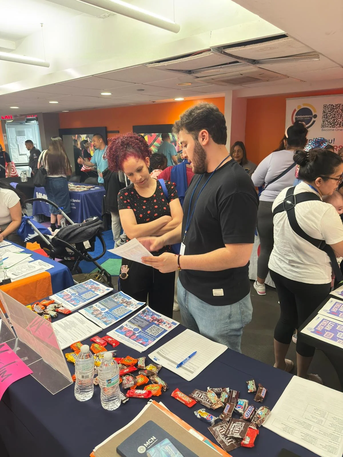 MCN case managers tabling for childcare enrollment outreach
