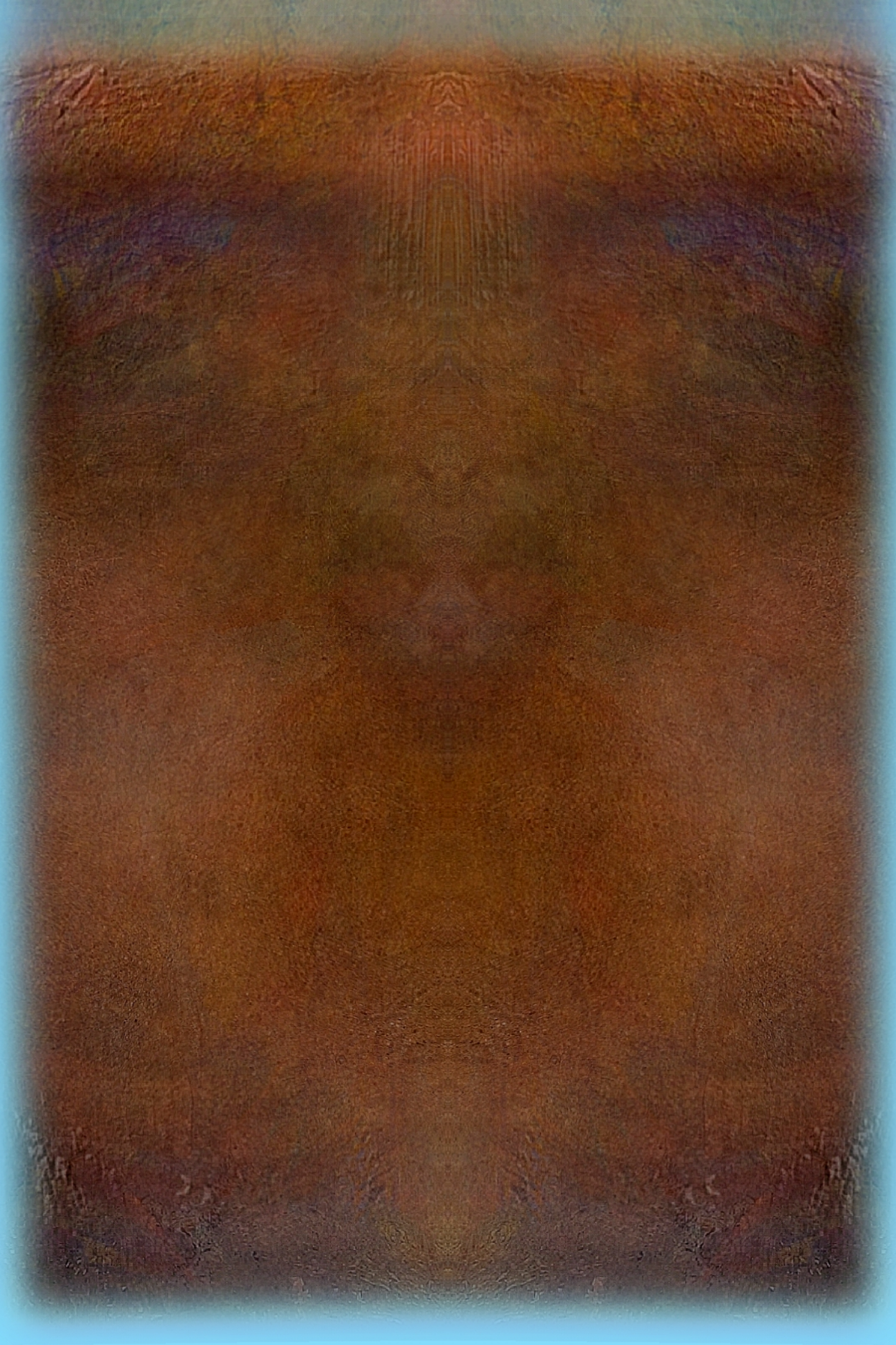 Close-up of a textured surface with a blend of brown and reddish hues.