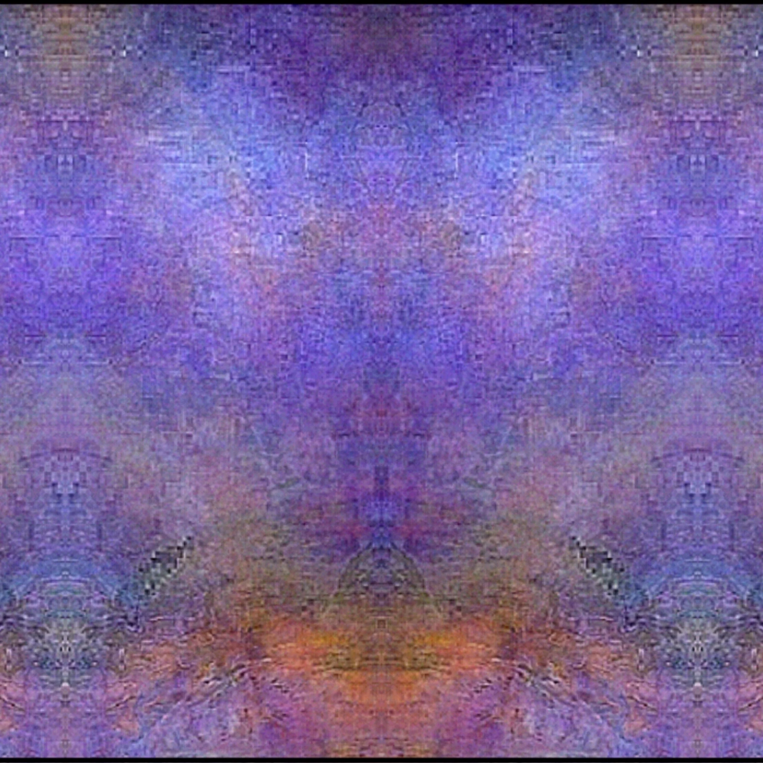 A close-up image of a textured surface with a gradient of colors, from purple to brown.