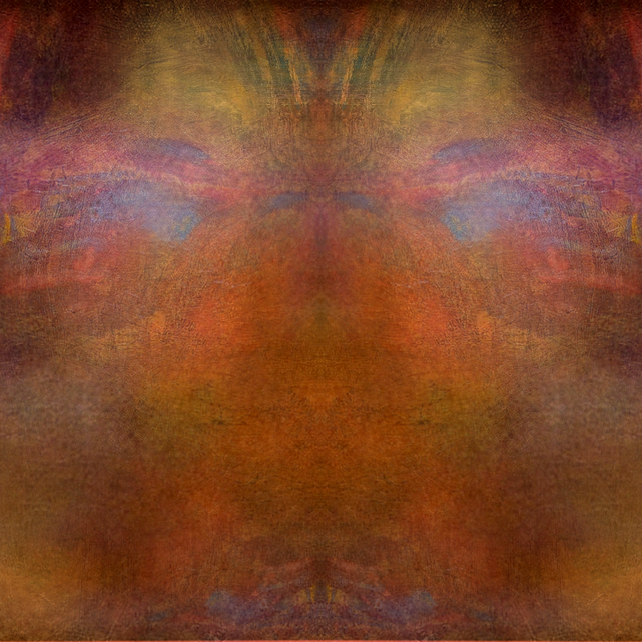 An abstract, symmetrical pattern with warm earthy tones of orange, brown, and yellow.