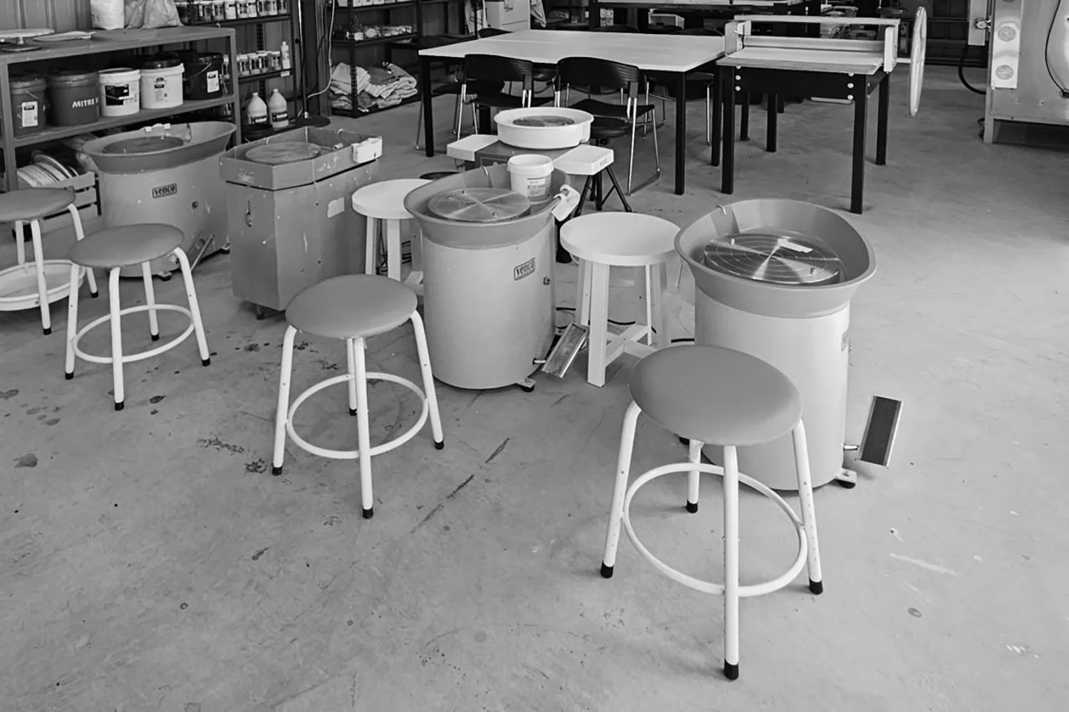 Studio pottery wheel with tools and clay ready for use