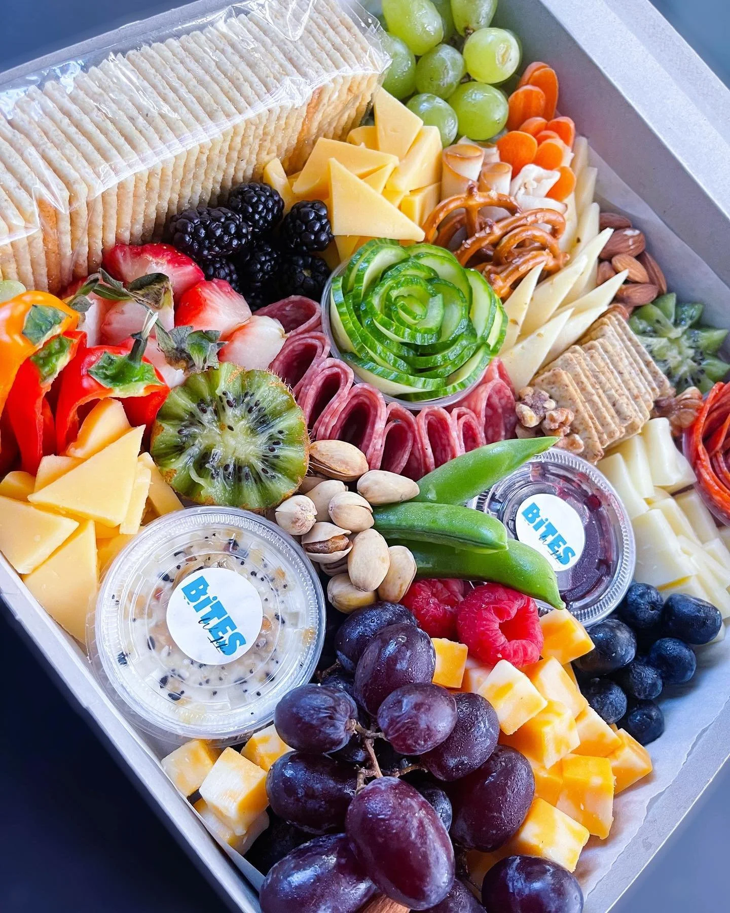 Gourmet graze boxes featuring artisan cheeses, meats and fresh fruit handcrafted by Bites We Like in Nassau, New Providence.