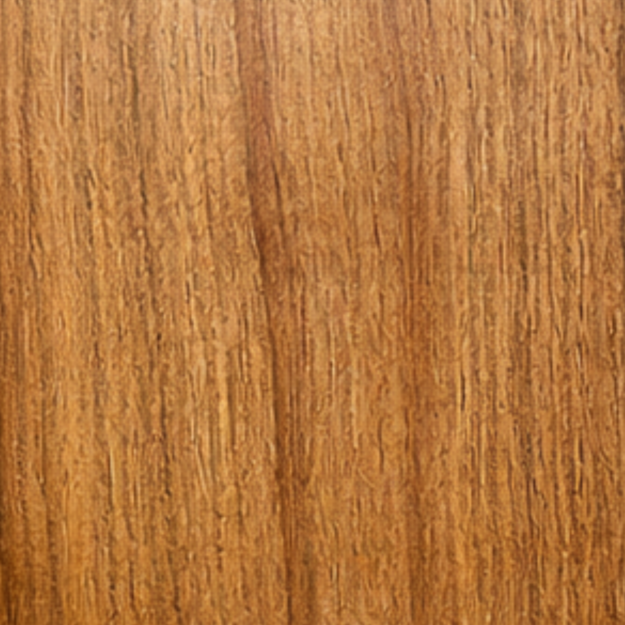 A close-up of a wooden surface with a grainy texture and a warm brown color.