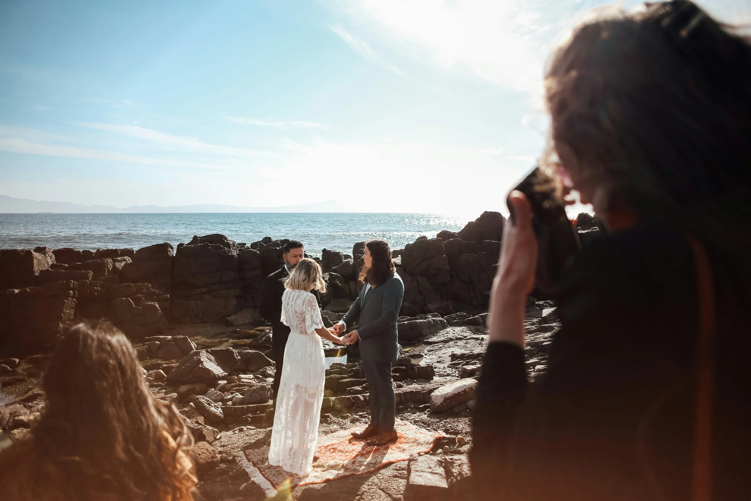 Young couple eloping at the beach