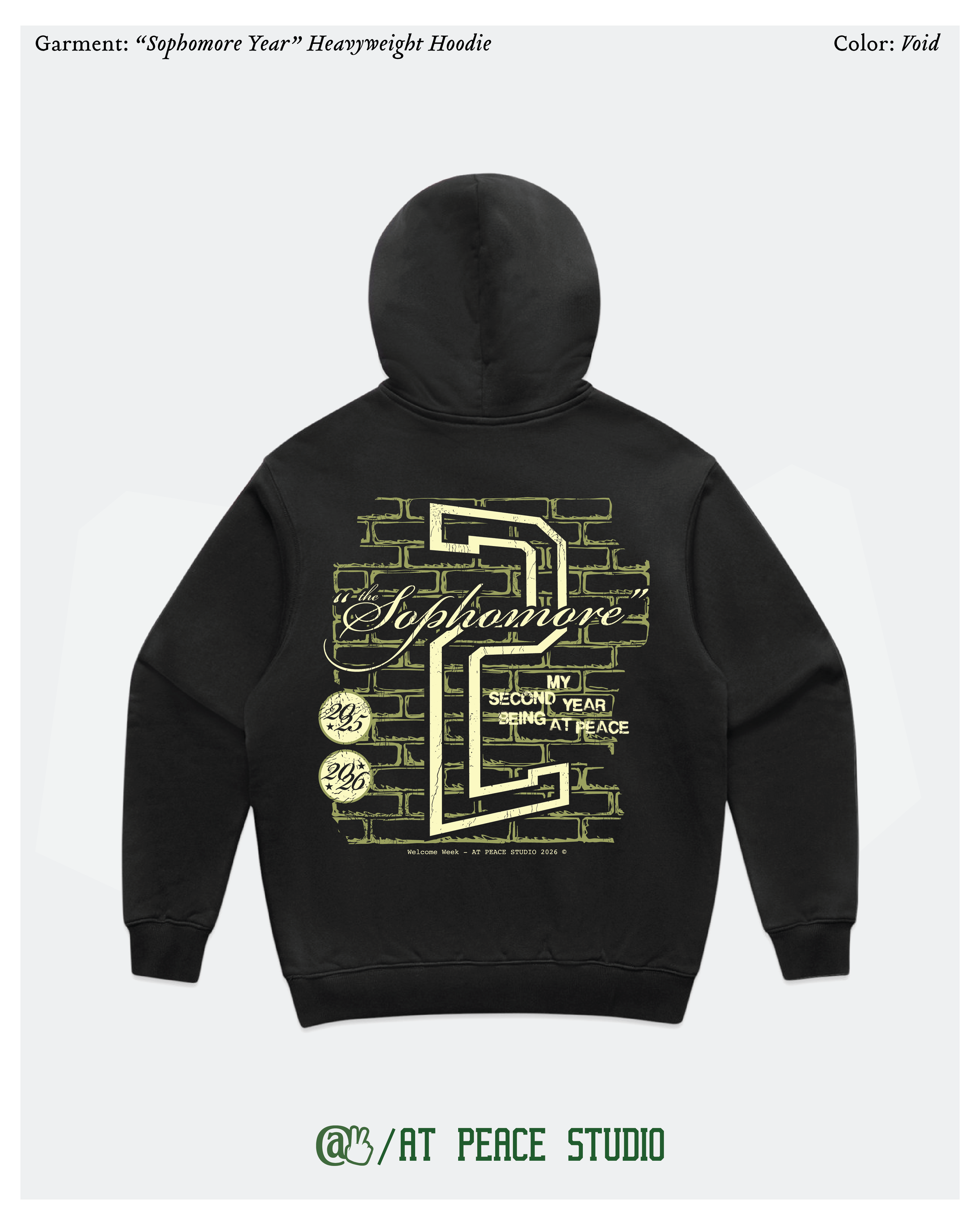 Black hoodie with graphic design on back. The design features a brick wall background, a large stylized number 2, and the text 'the Sophomore' in cursive with additional phrases related to being a sophomore year, such as 'My second year being at peace' and dates 2025 and 2026. The bottom of the design includes the phrase 'Welcome week – AT PEACE STUDIO 2026'.