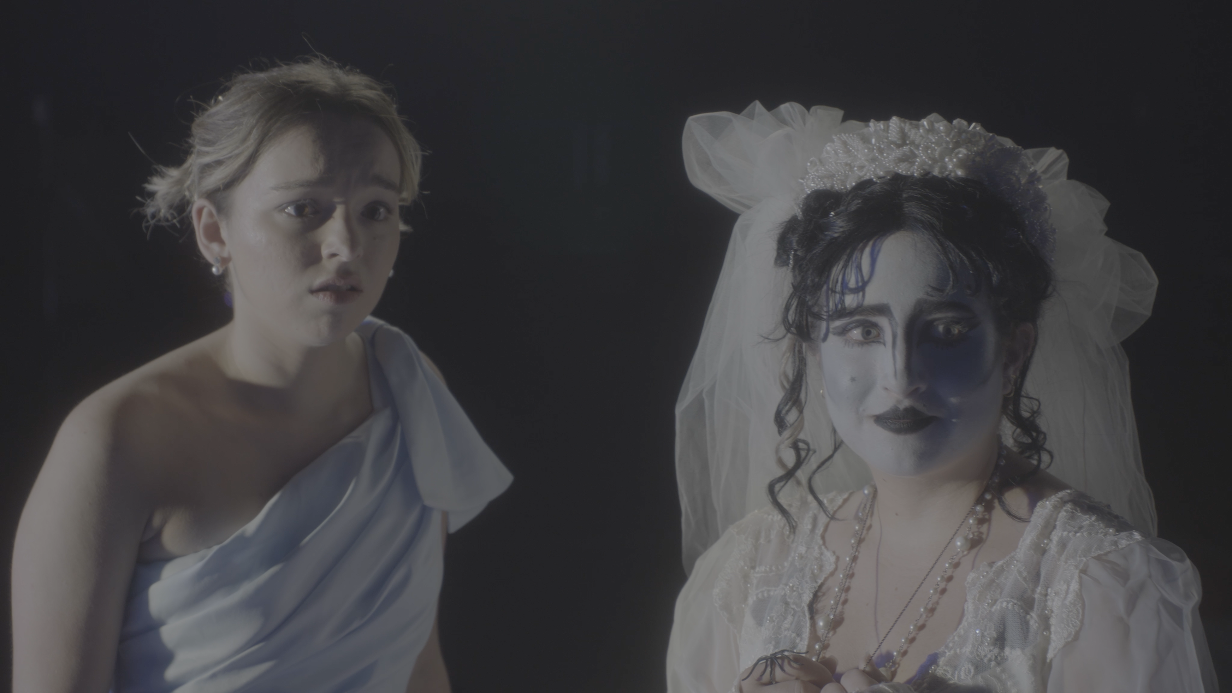 Two women in a short gothic drama film and score