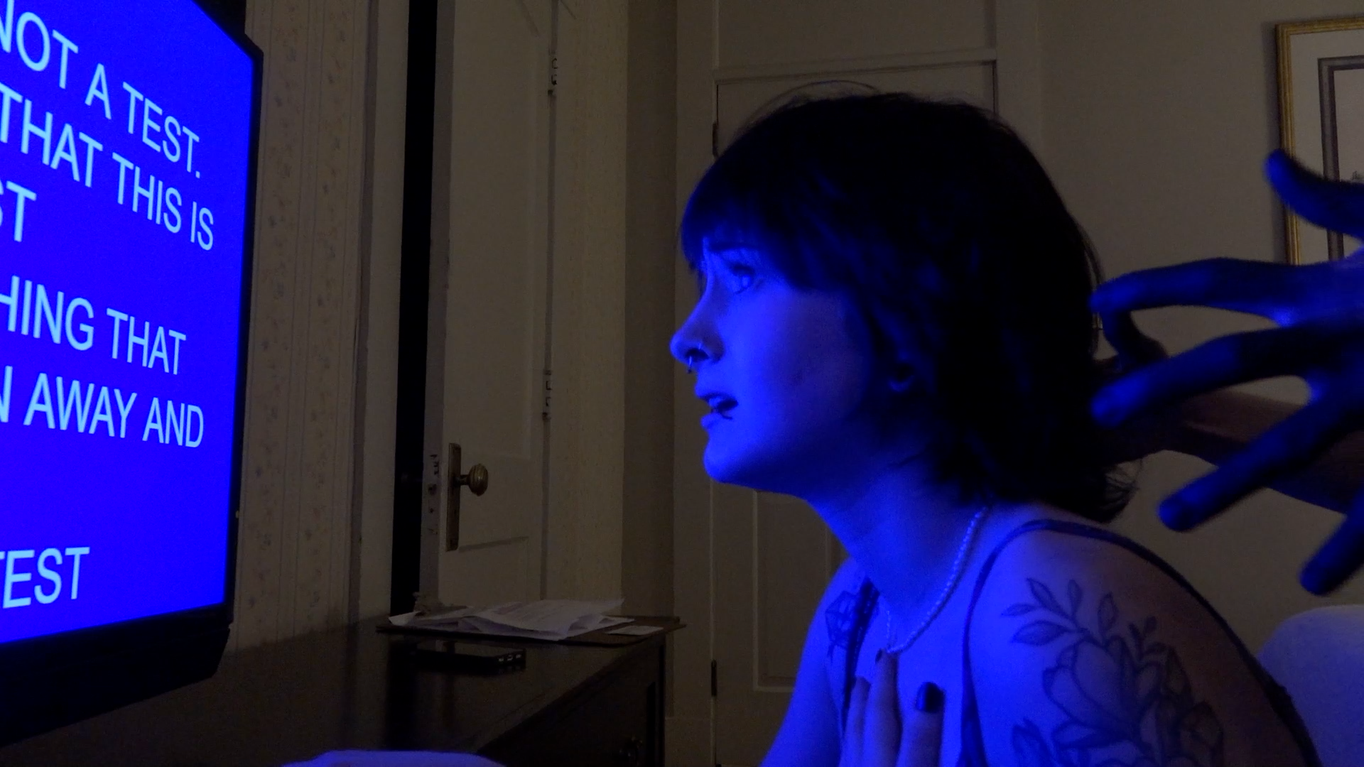 Woman being attacked in short horror film film