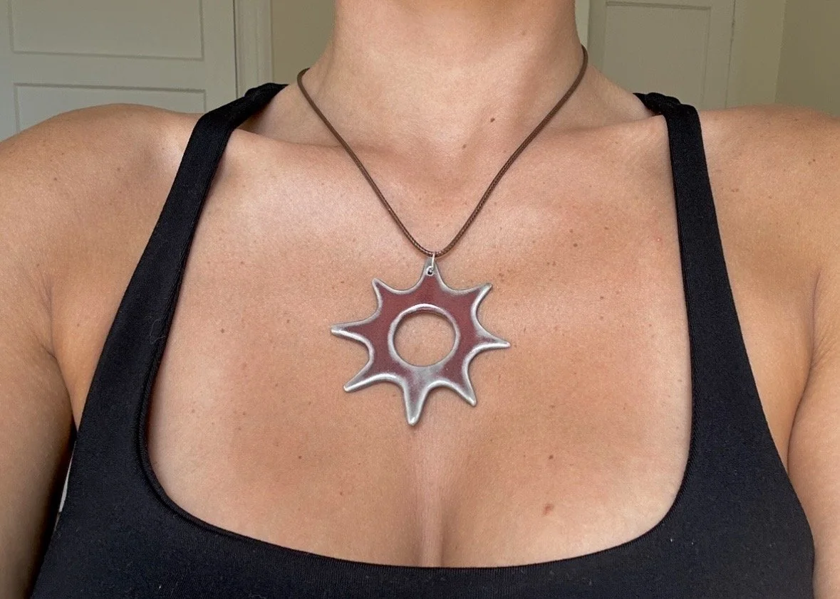 red sun necklace