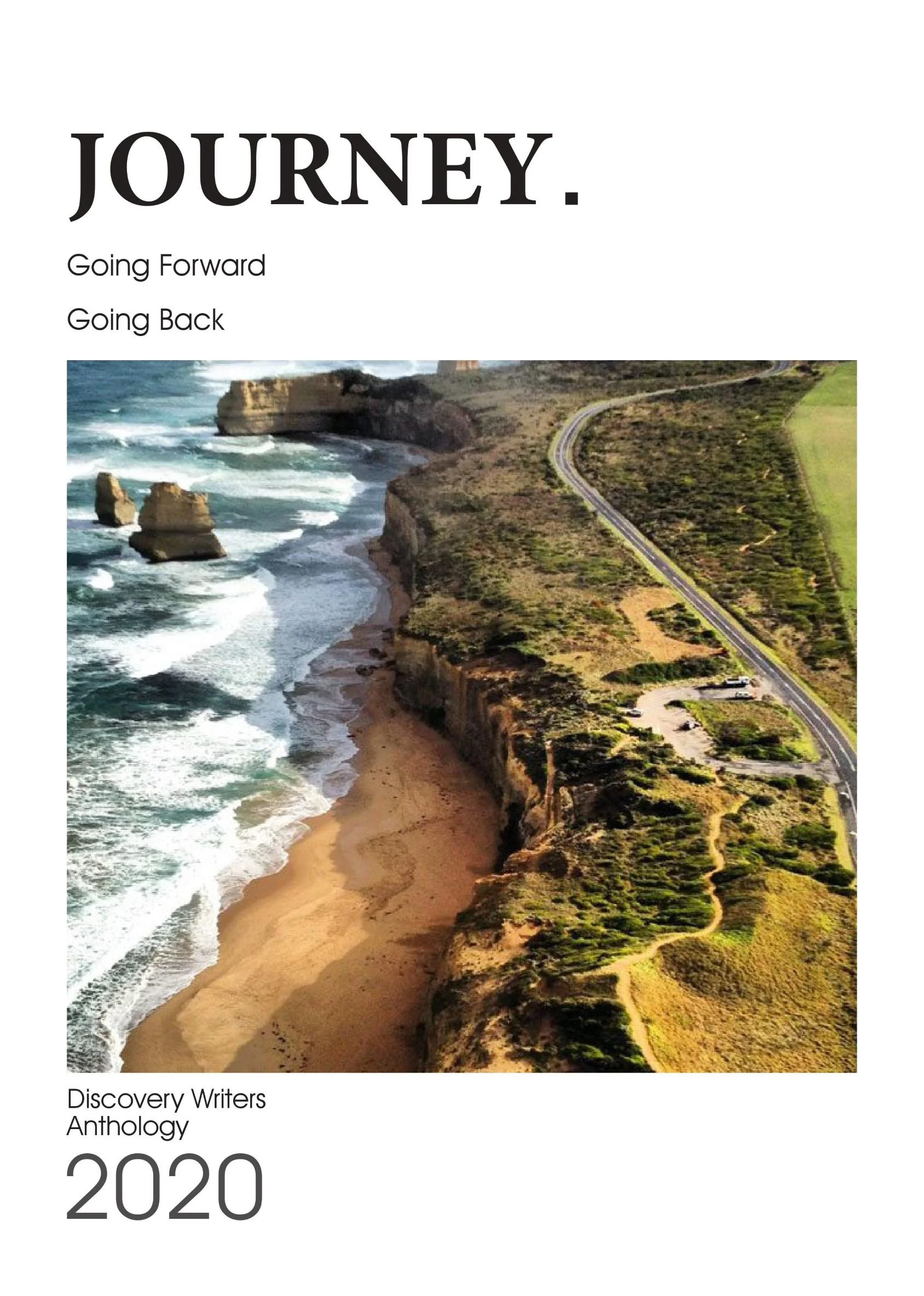Cover of Discovery Writers Anthology 2020 featuring an aerial view of a coastline with cliffs, waves, and a winding road through green hills.