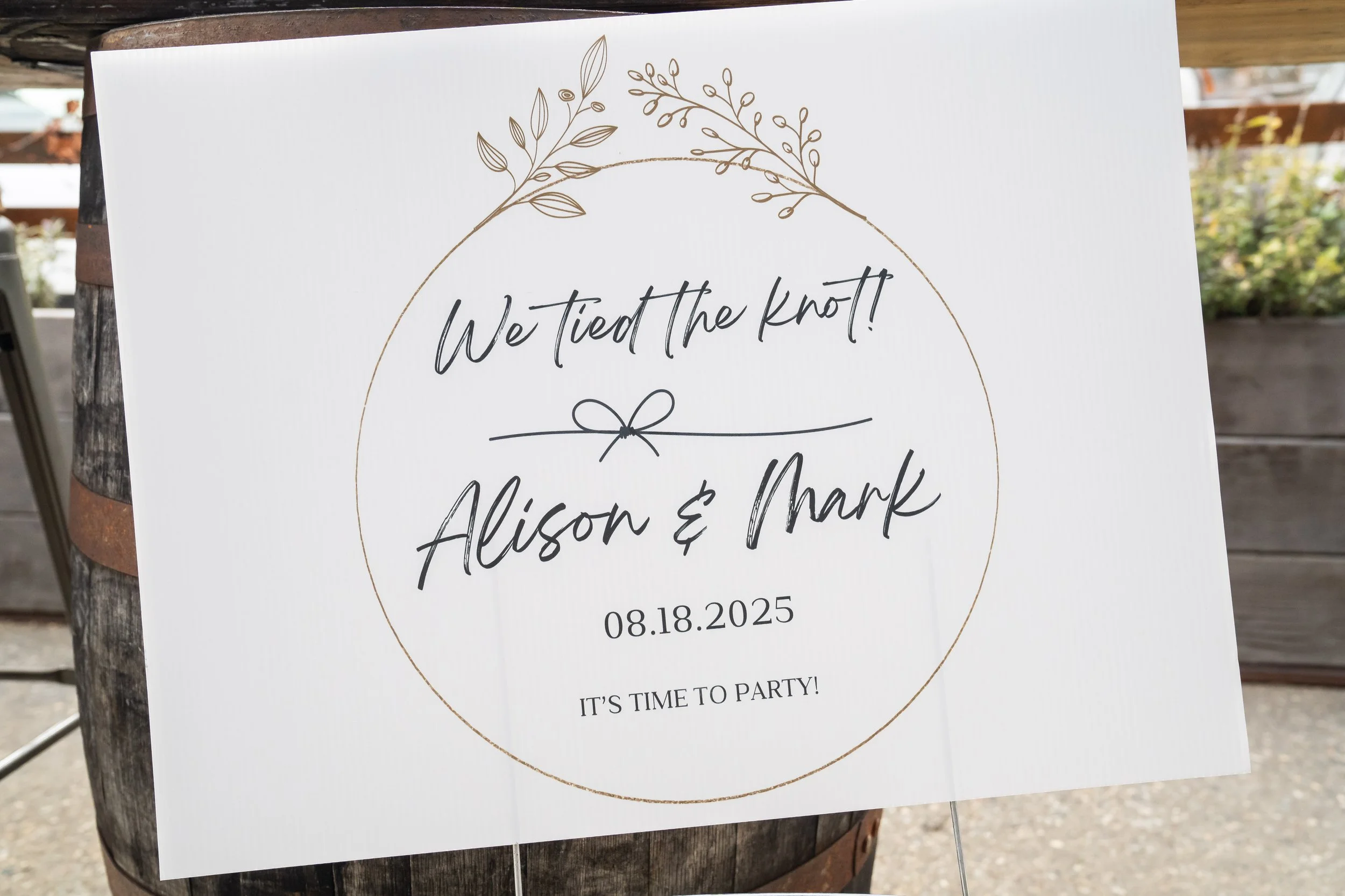 A sign that says 'We tied the Knot' welcoming guests to a post-elopement reception at Structures Brewing in Bellingham.