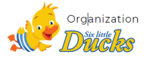 Logo of Six Little Ducks organization featuring a cartoon yellow duckling with blue and orange striped shorts.