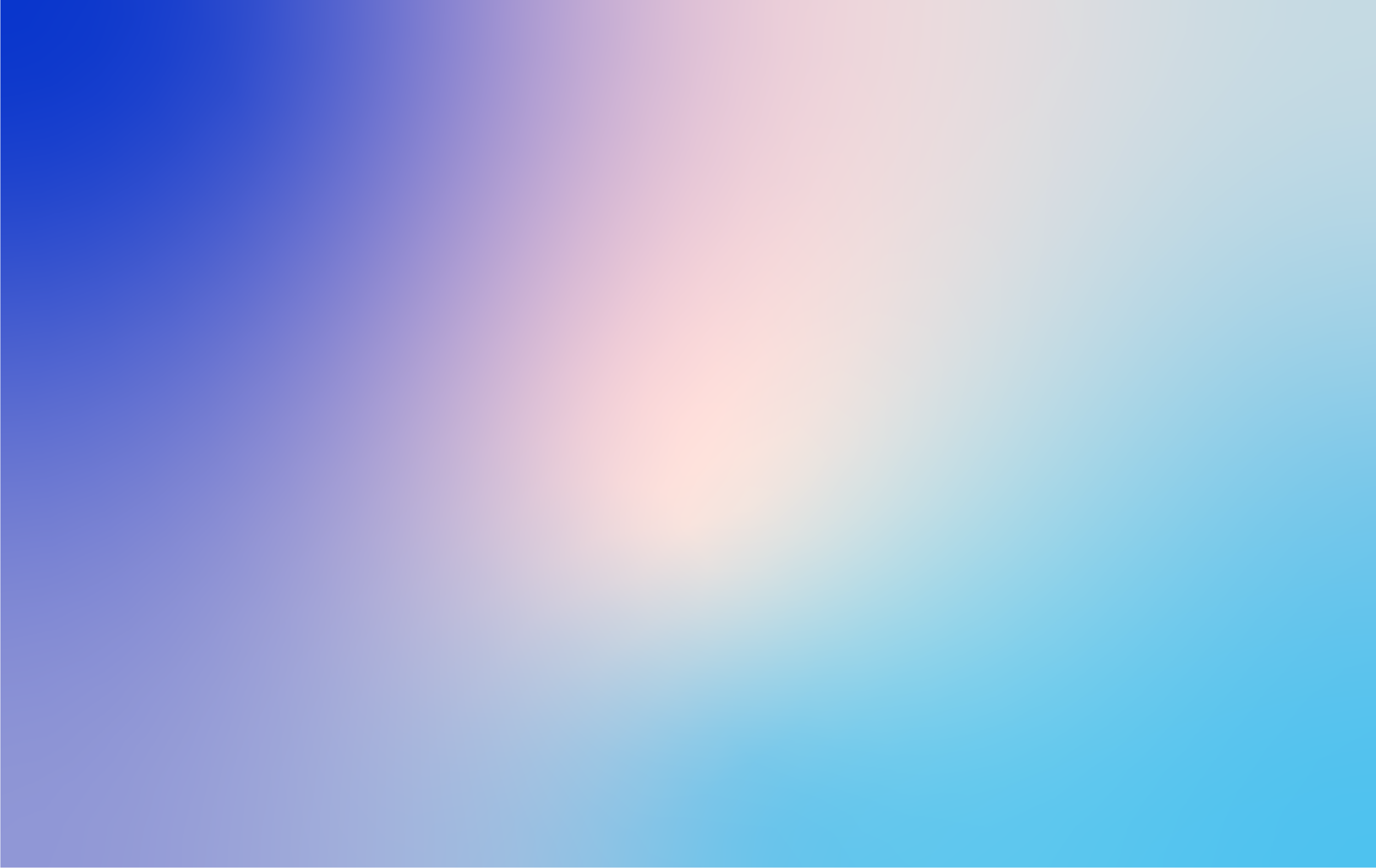 Blurred abstract background with gradient shades of blue, pink, and purple.