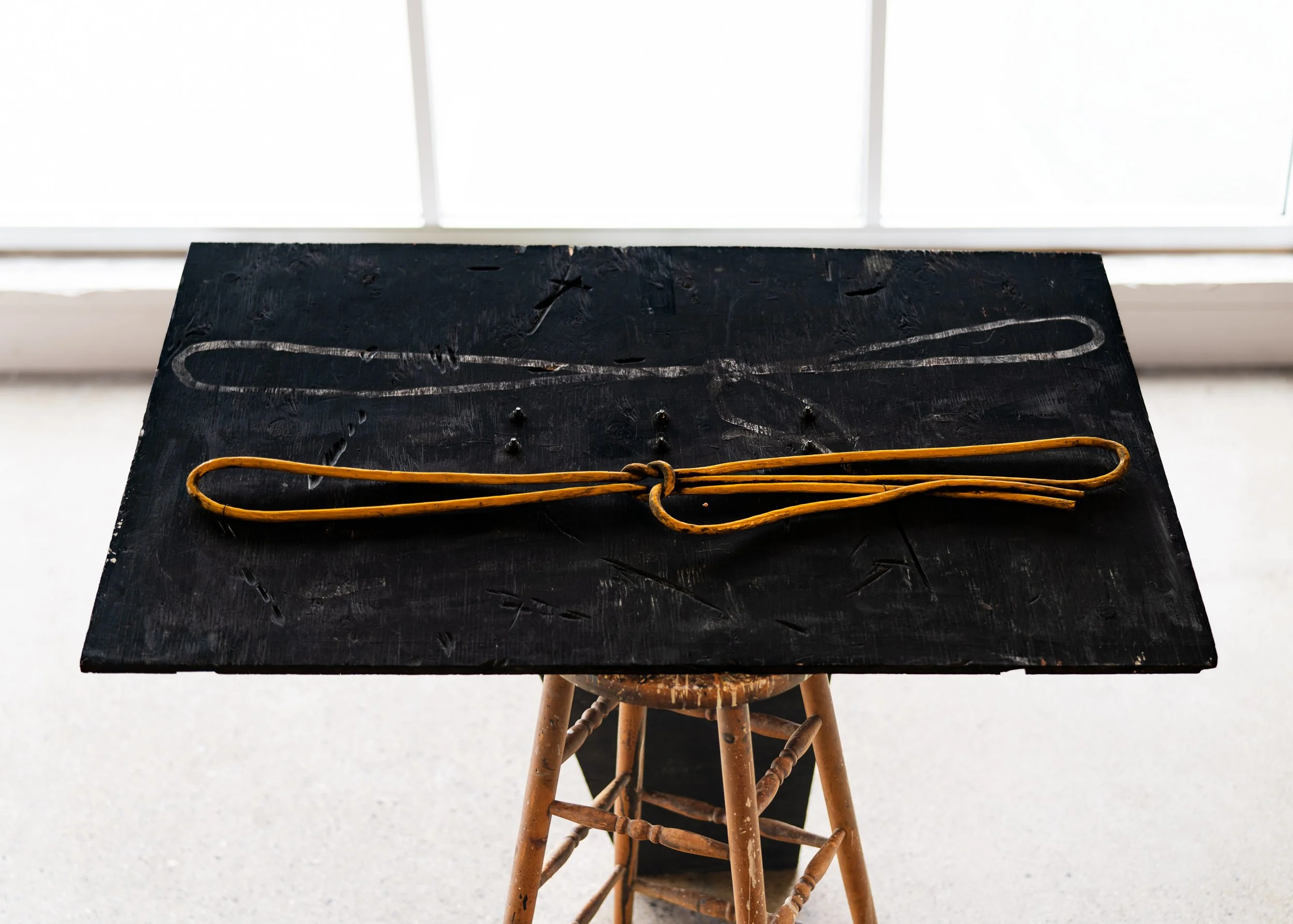 Tom Fools Knot, carved and painted wood on wood construction with stool, 48 x 40 x 36 in, 2023
