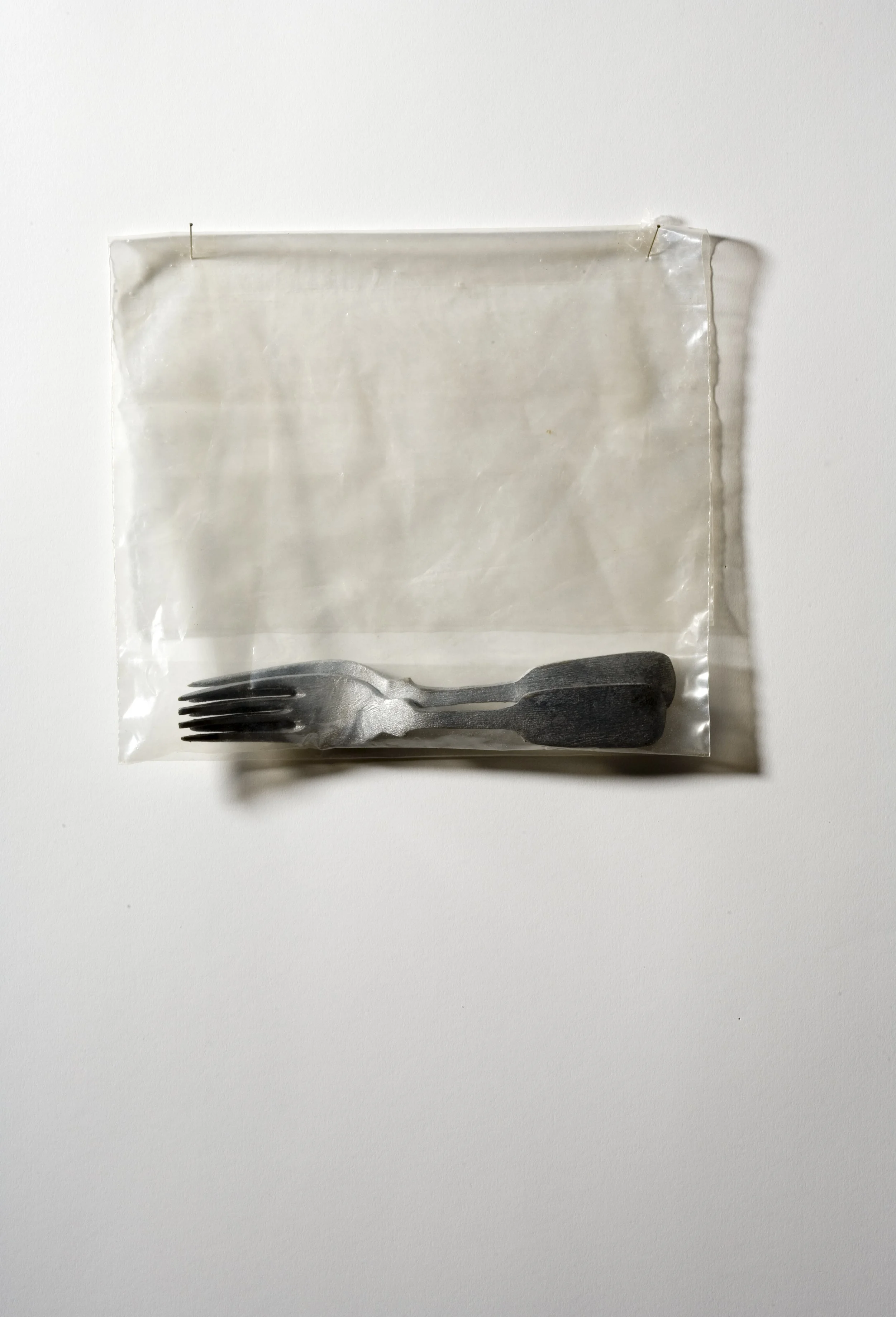 Forks, carved and painted wood with plastic bag, 2002
