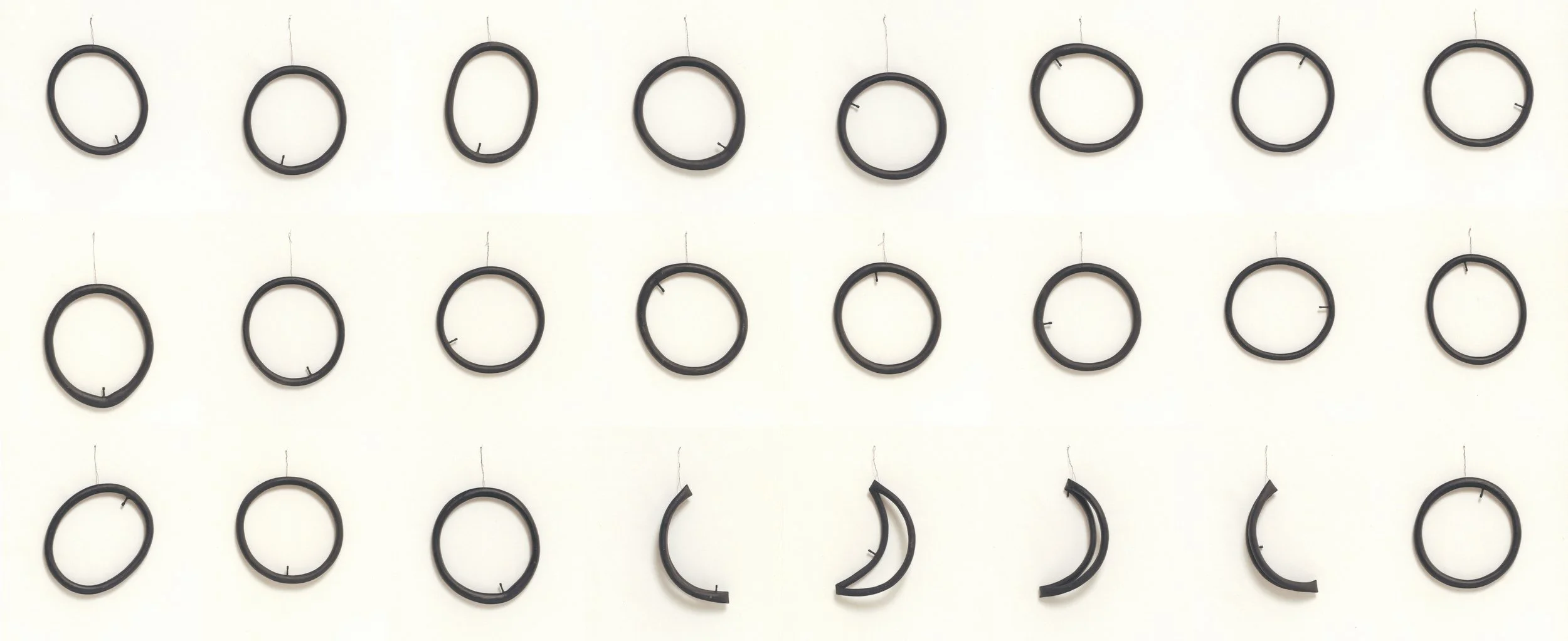 24 Tubes, carved and painted wood, 2007