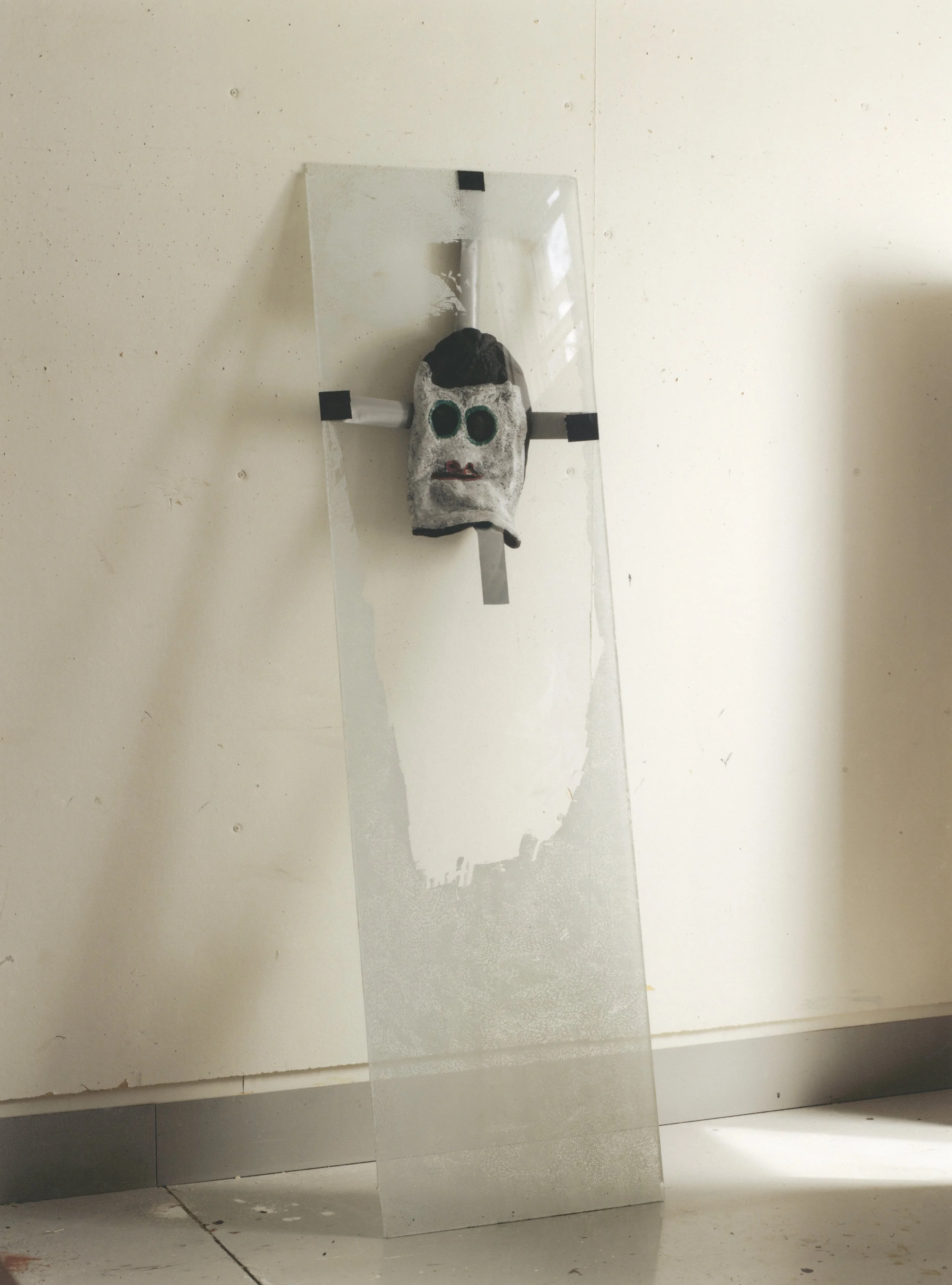 Under Hat, carved and painted wood with tape and painted glass, 2015