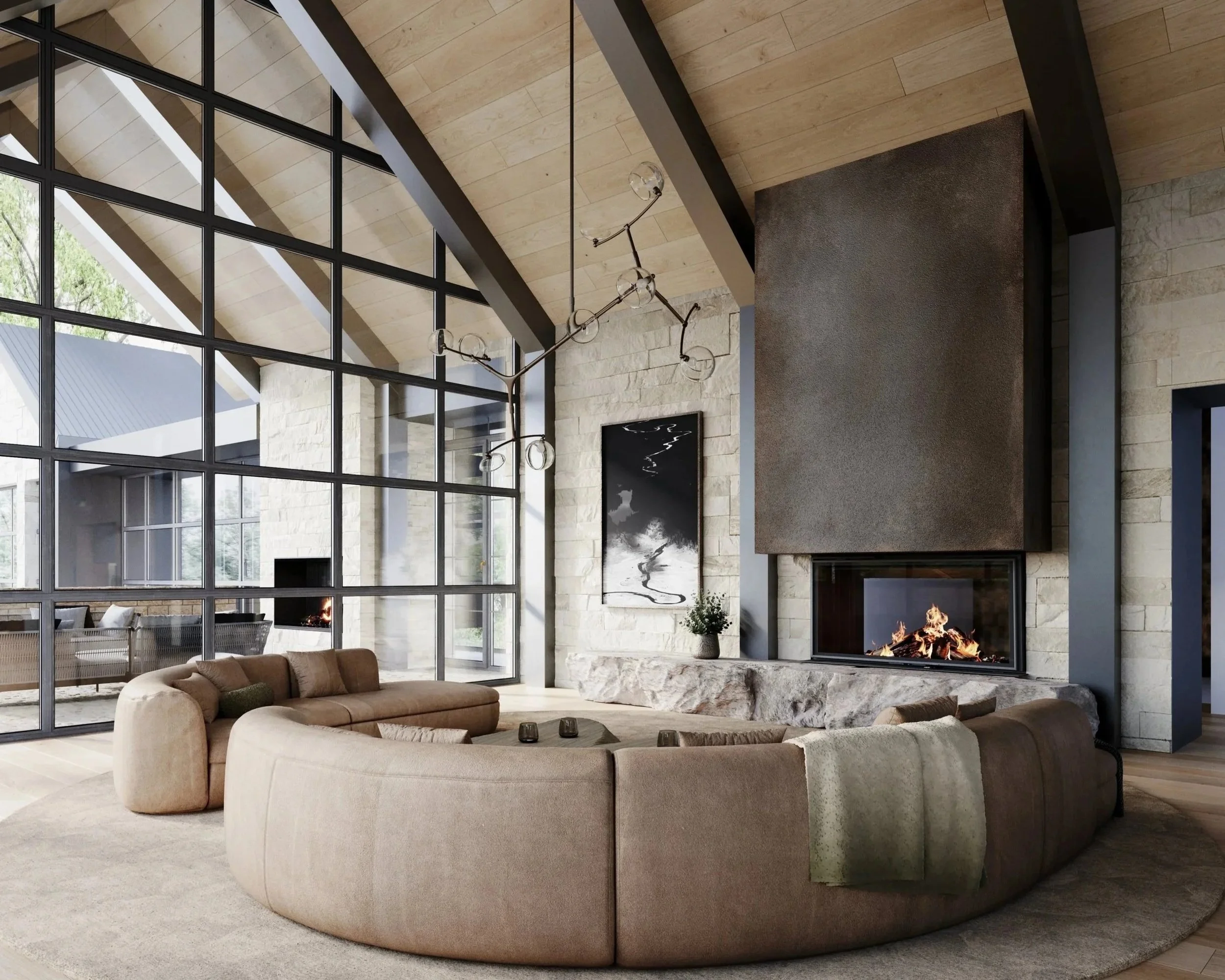 Mountain home living room with a vaulted wood ceiling, steel fireplace surround, and curved sectional by Suede Studio