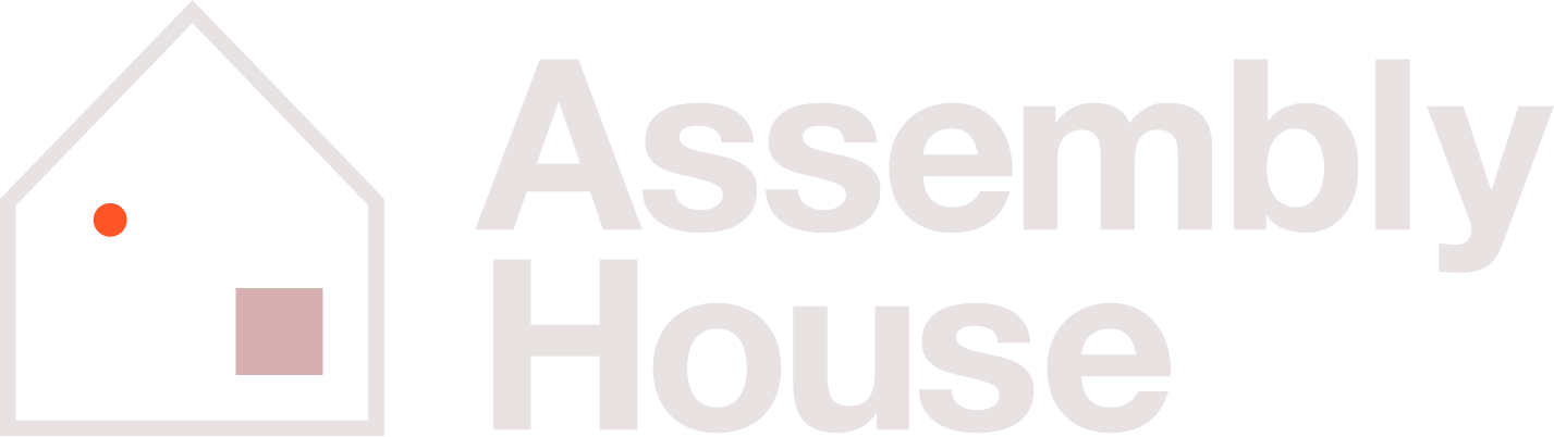 Logo of a house with a red dot and pink window on the left, and the words "Assembly House" in large gray letters on the right.