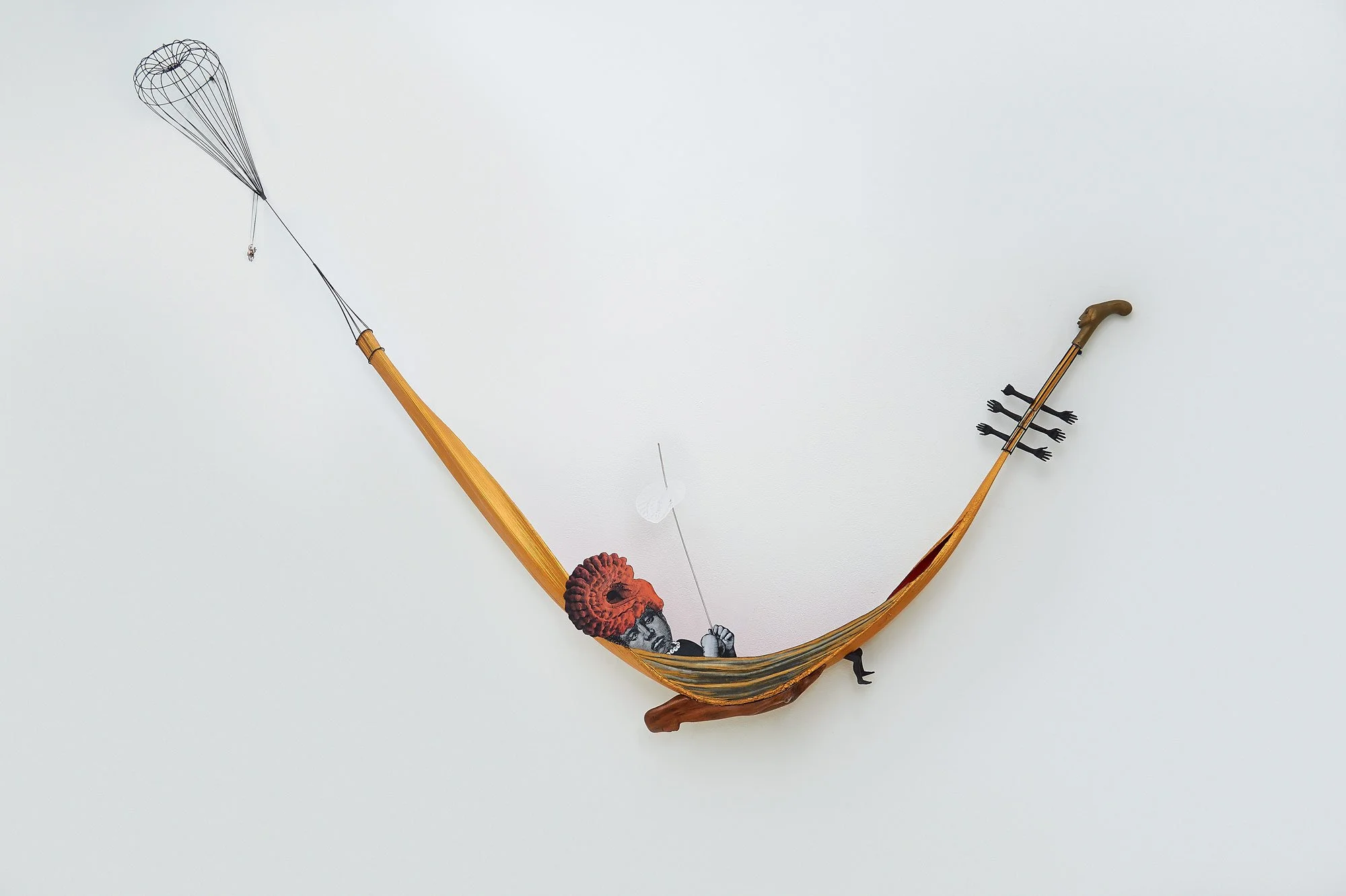 Frond A Cradle for my Dreams . Palm Frond, Bronze, cedar, paper image on MDF, Plexi and resin.approx 8' copy.jpg